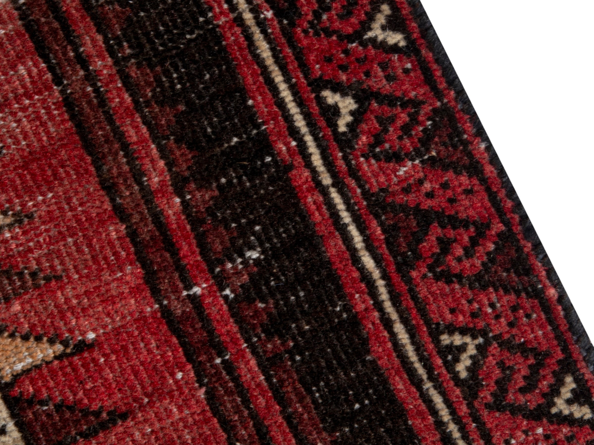Persian Baluch runner rug in faded red and navy, view 9 of 18
