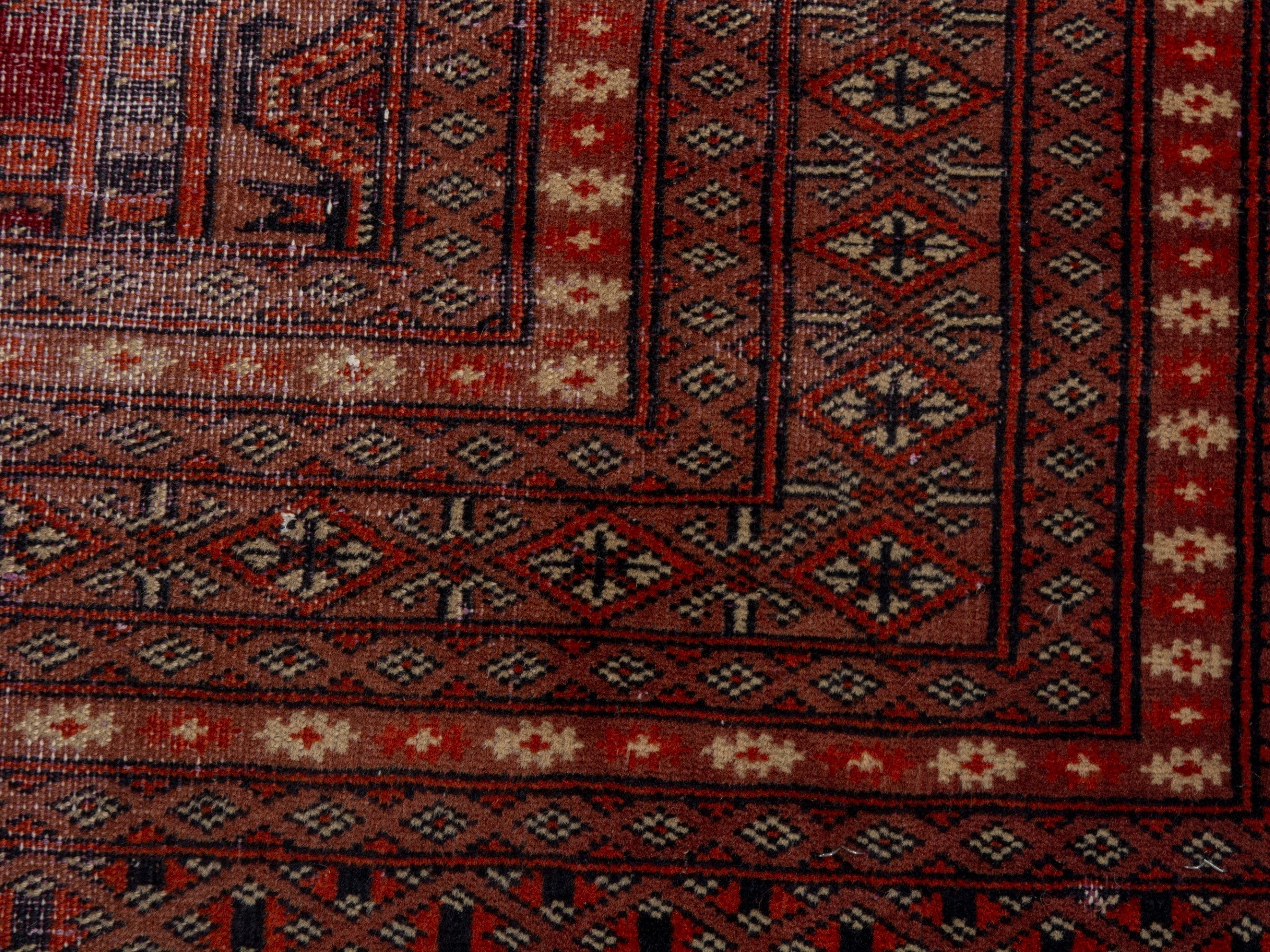 Persian Torkaman accent rug in burgundy and rust, view 11 of 18