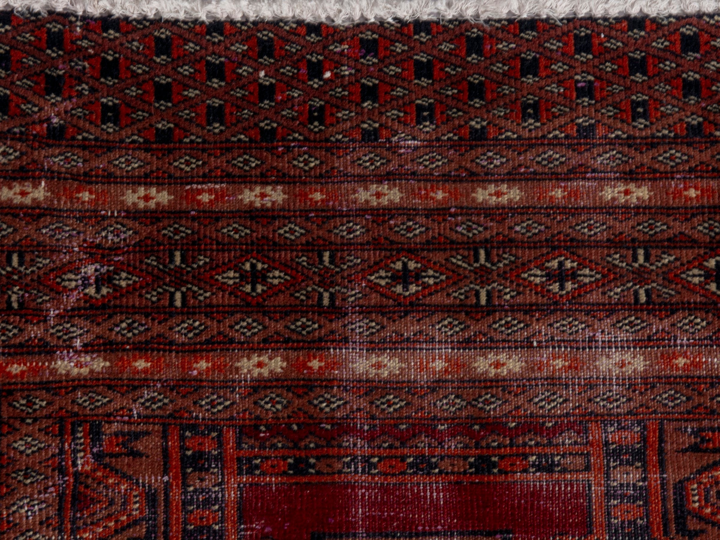 Persian Torkaman accent rug in burgundy and rust, view 13 of 18