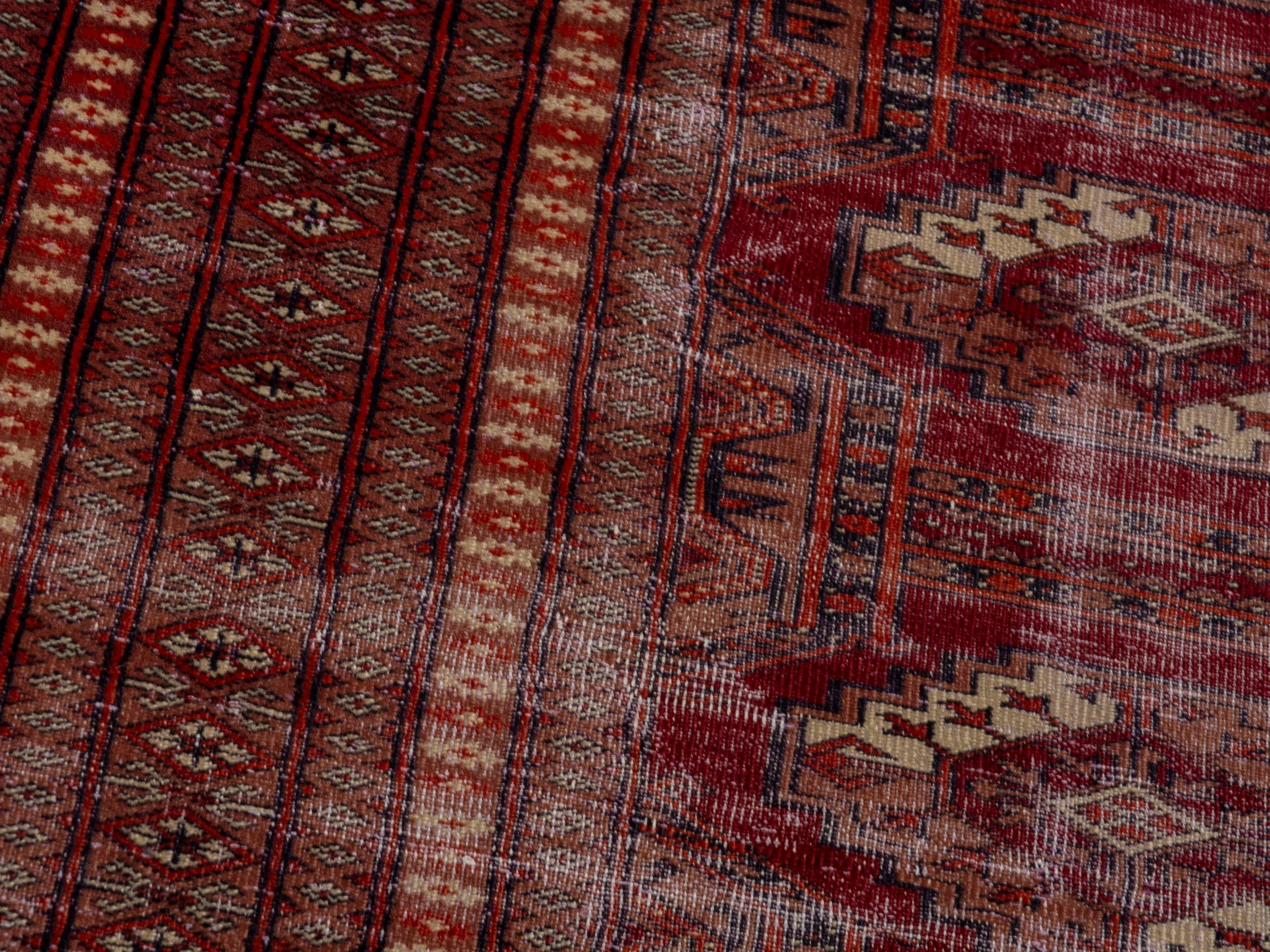 Persian Torkaman accent rug in burgundy and rust, view 9 of 18