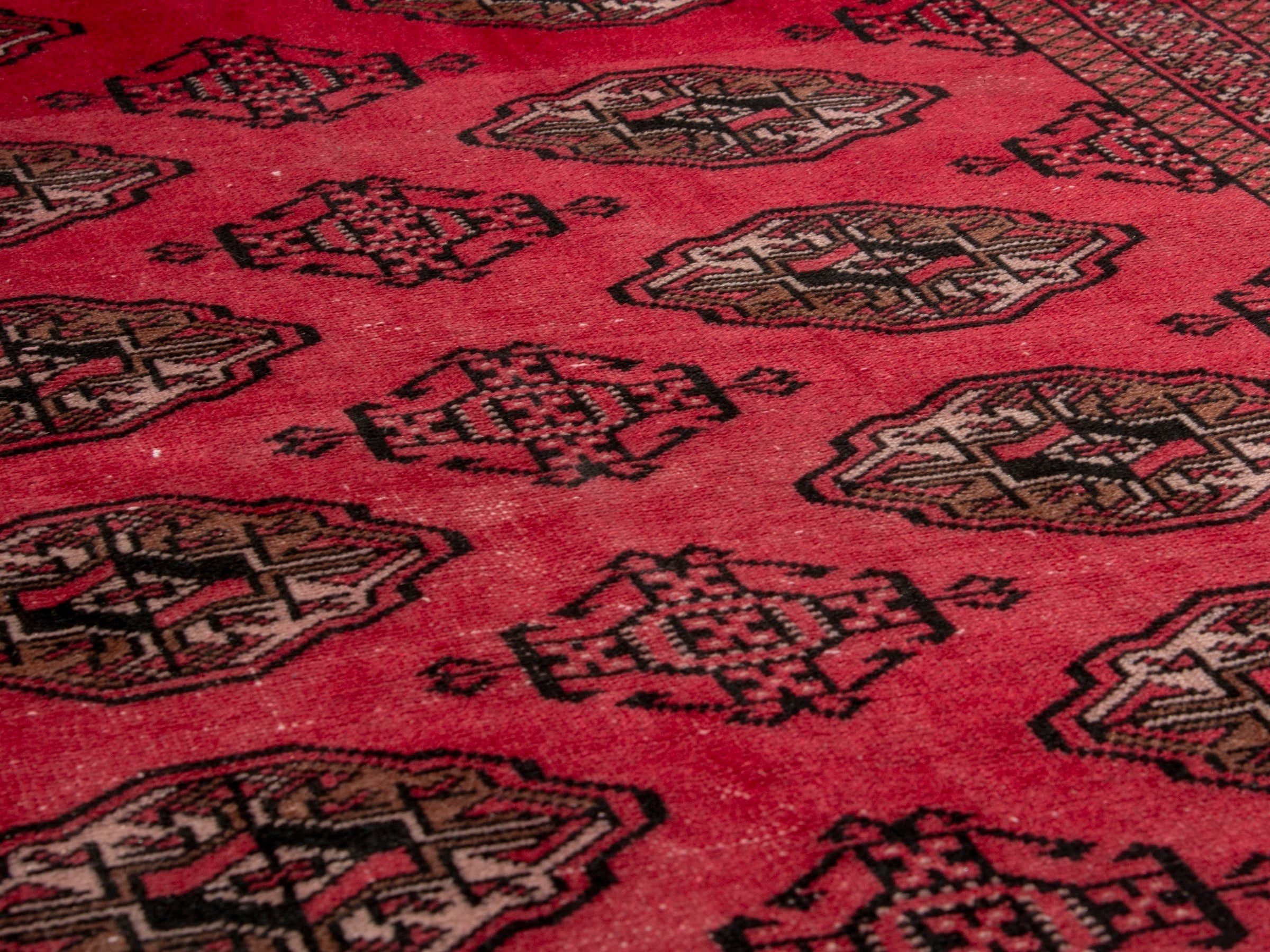 Persian Torkaman accent rug in deep red and dark brown, view 8 of 17