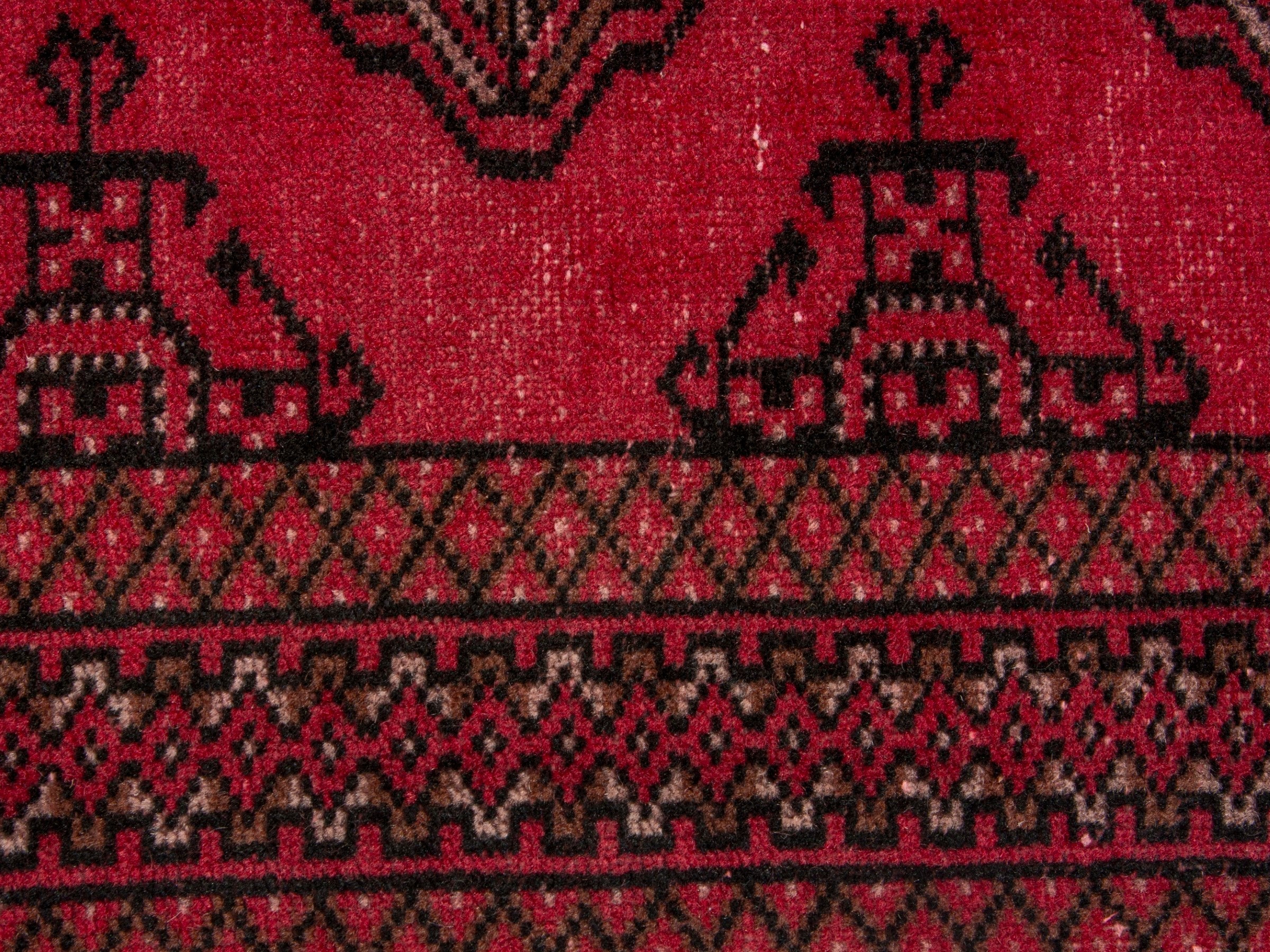 Persian Torkaman accent rug in deep red and dark brown, view 13 of 17