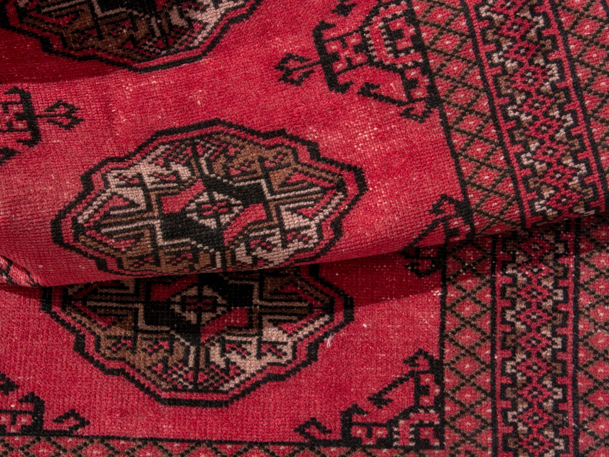 Persian Torkaman accent rug in deep red and dark brown, view 14 of 17