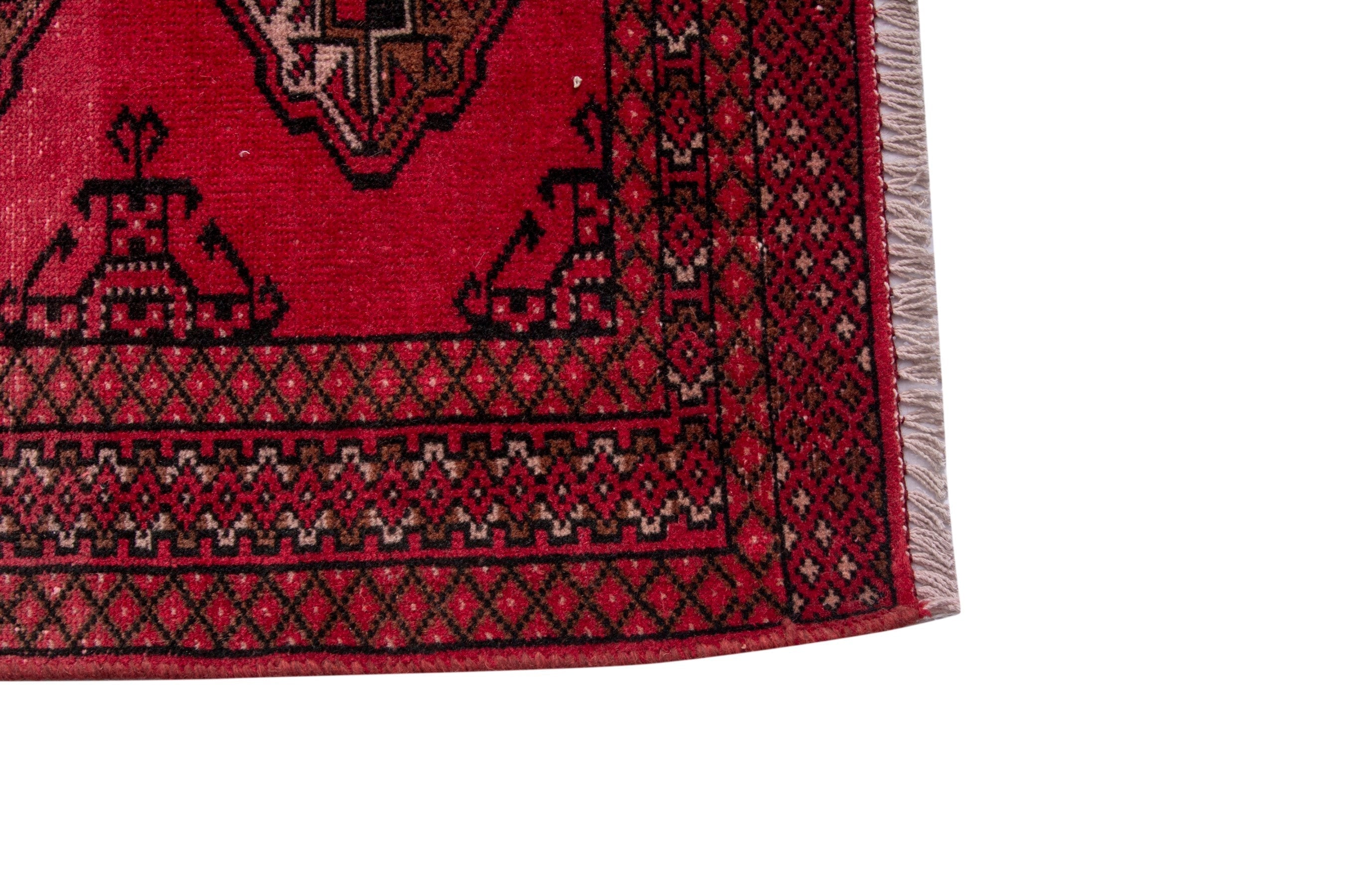 Persian Torkaman accent rug in deep red and dark brown, view 10 of 17