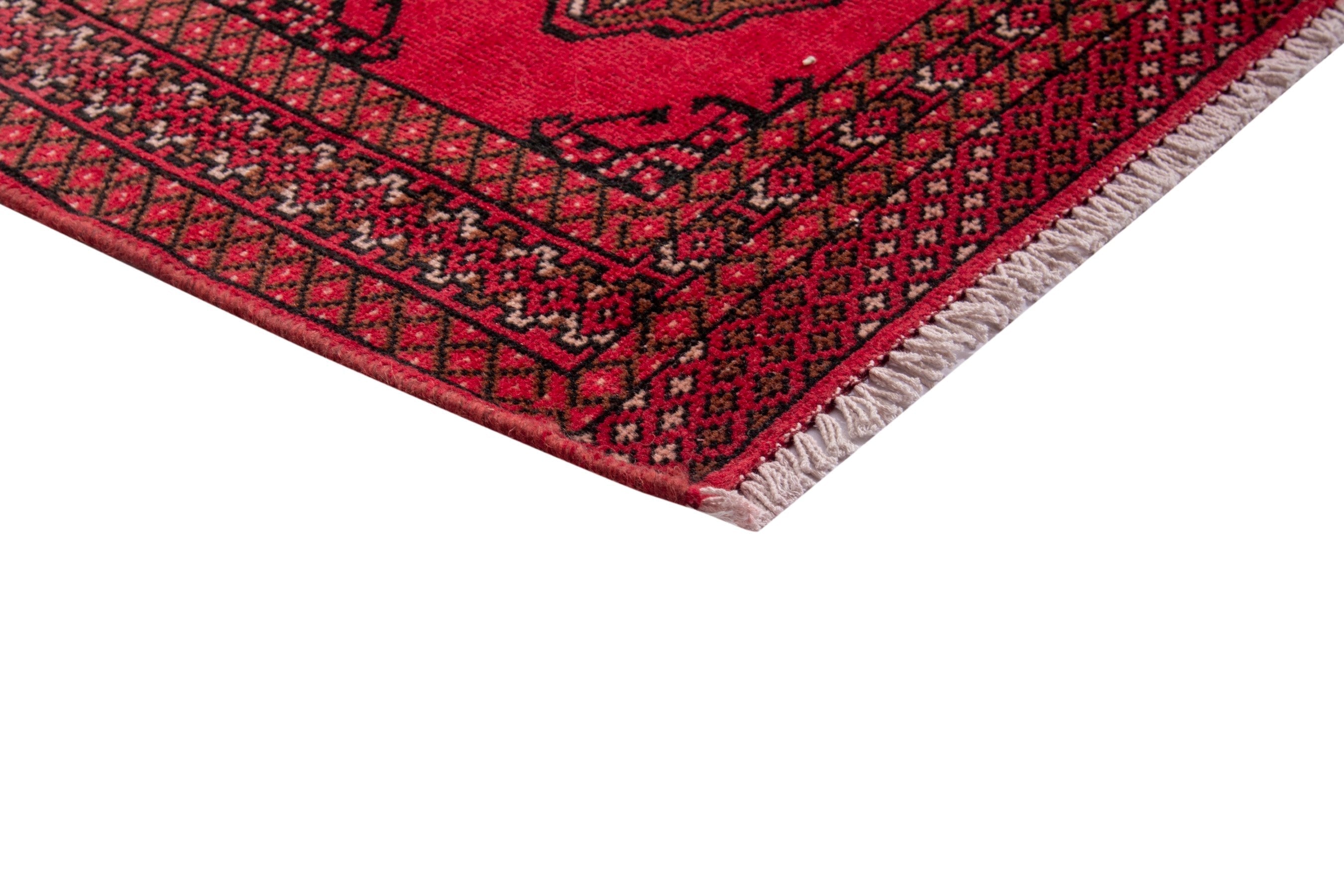 Persian Torkaman accent rug in deep red and dark brown, view 5 of 17
