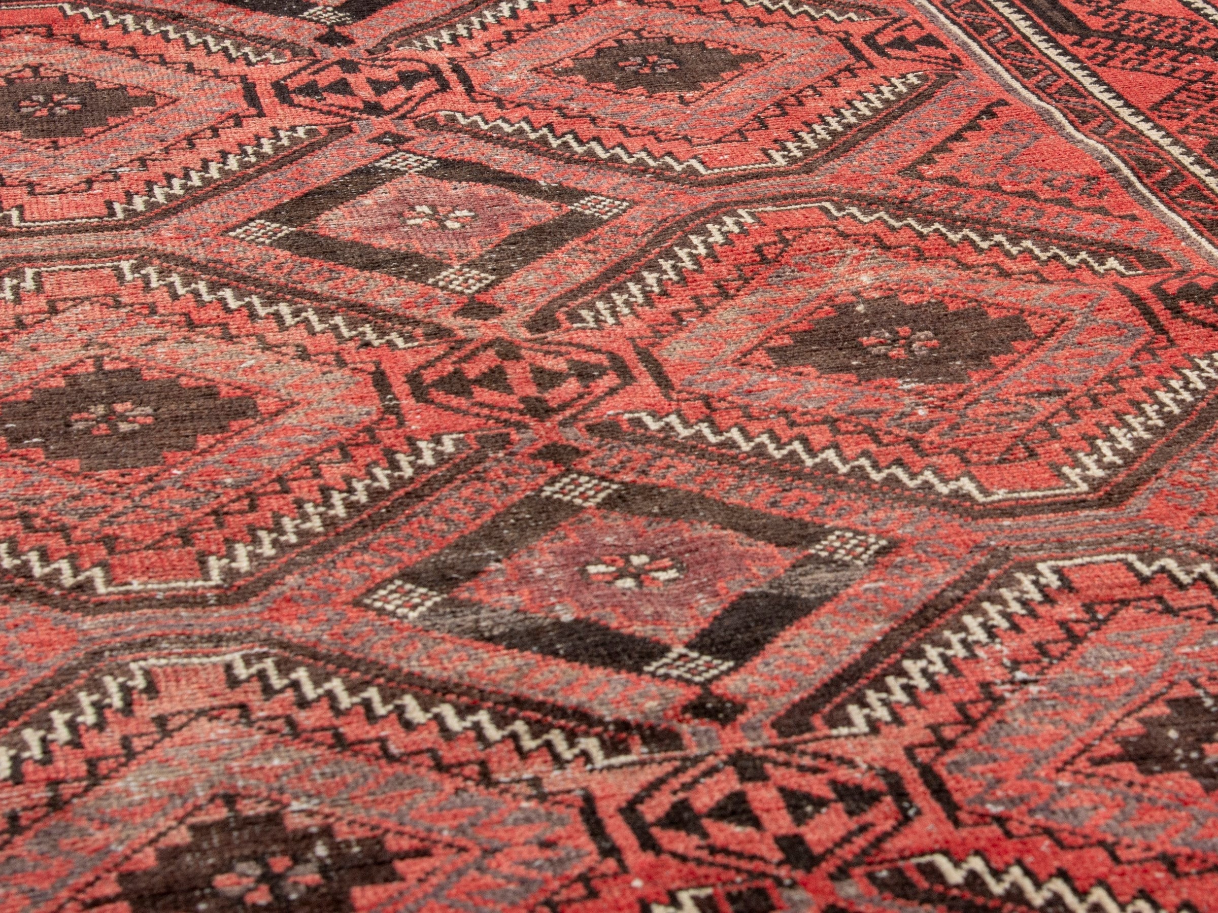 Persian Baluch runner rug in deep red and burgundy, view 8 of 17