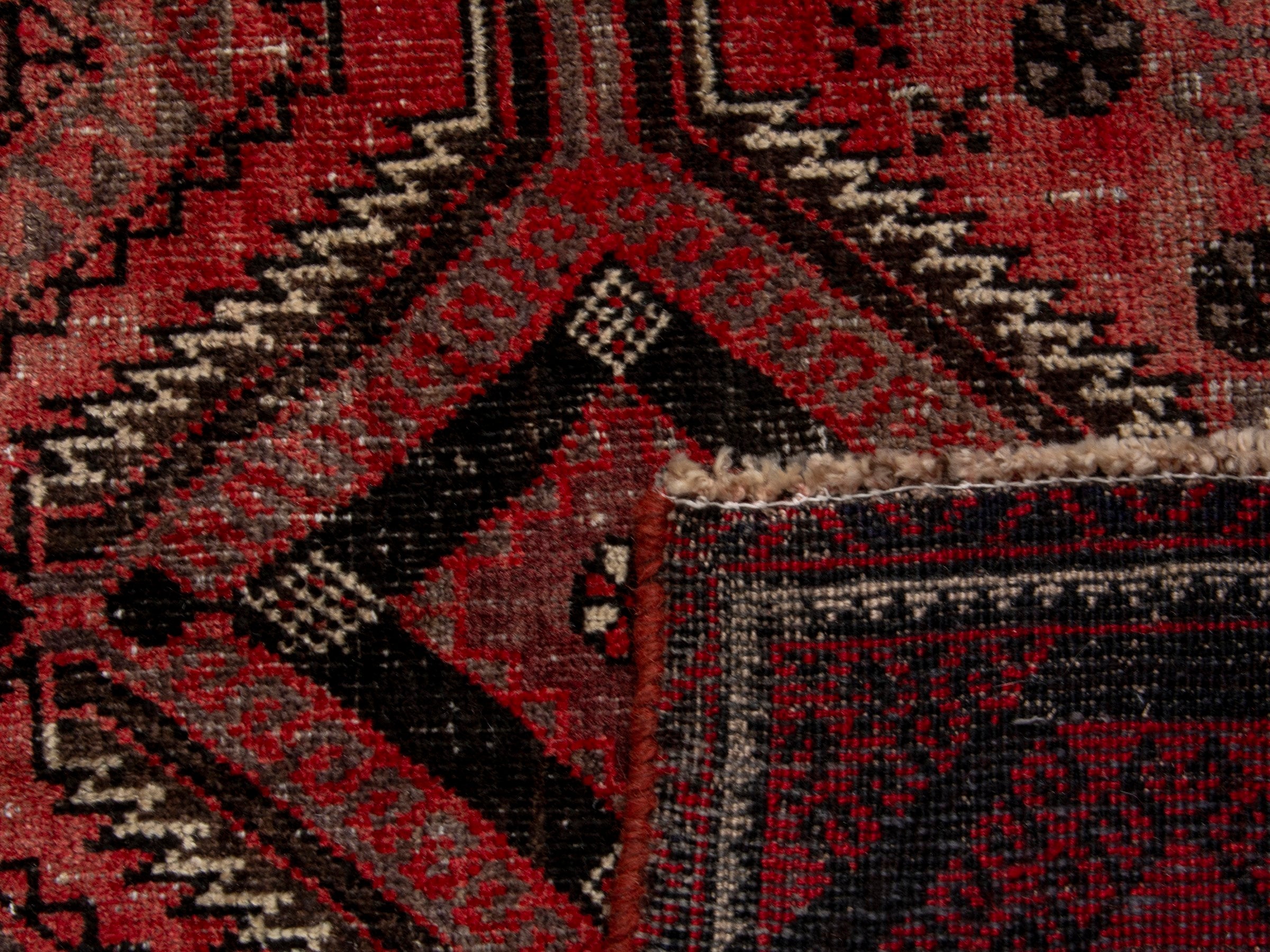 Persian Baluch runner rug in deep red and burgundy, view 17 of 17