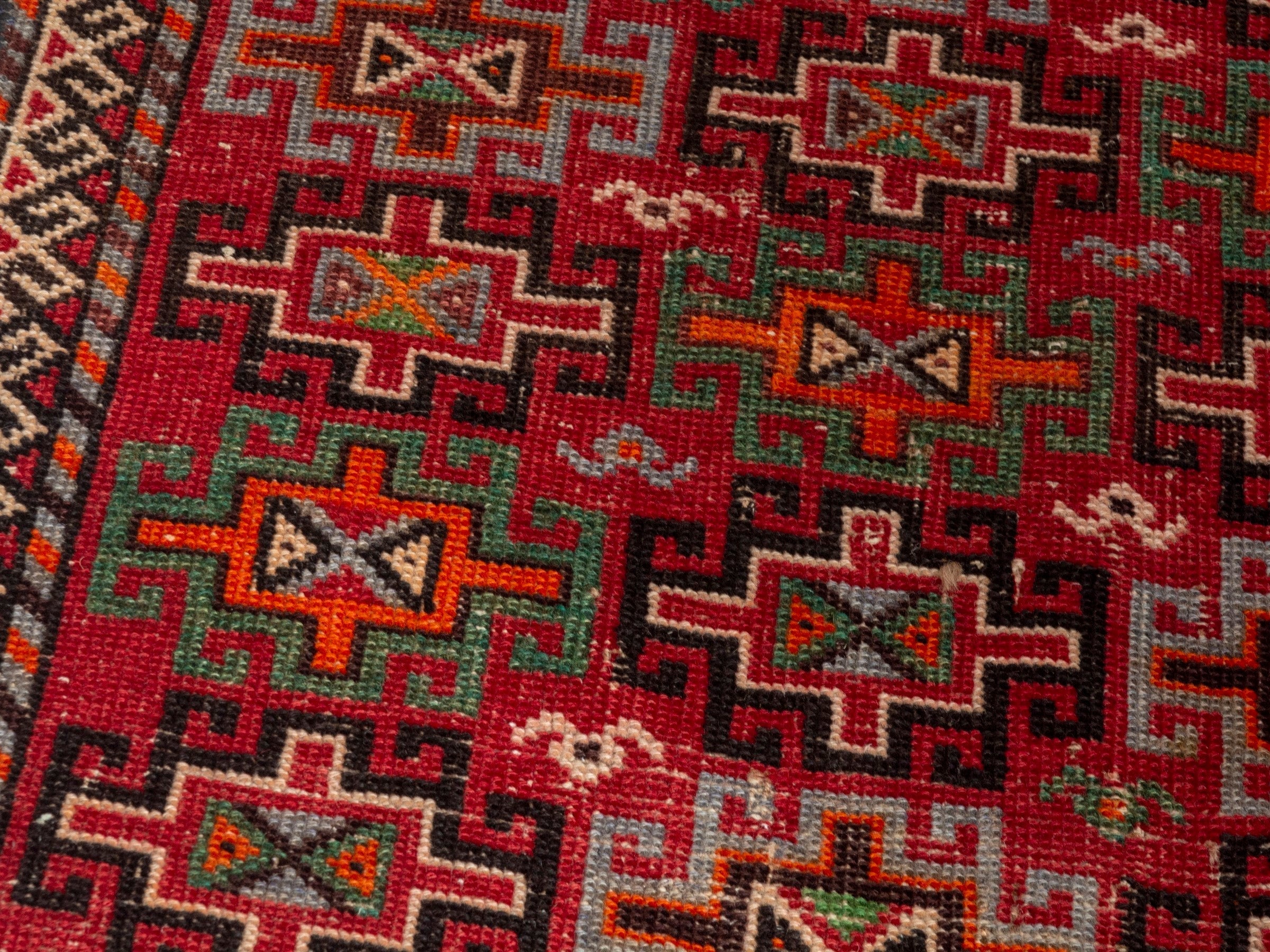 Persian Baluch accent rug in deep red and cream, view 9 of 18