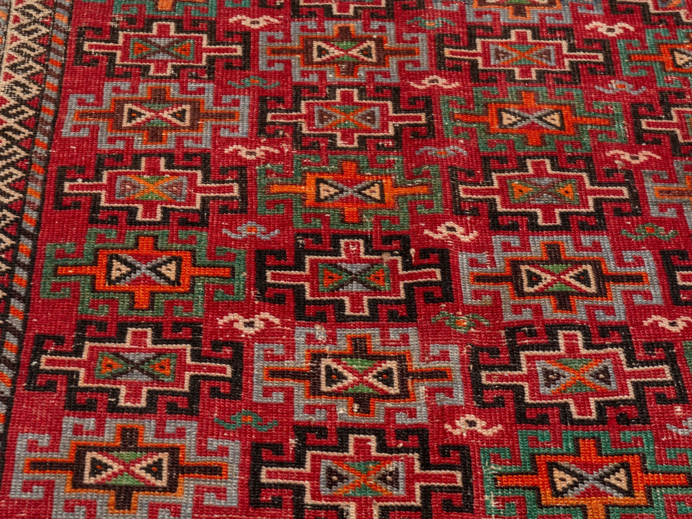 Persian Baluch accent rug in deep red and cream, view 7 of 18