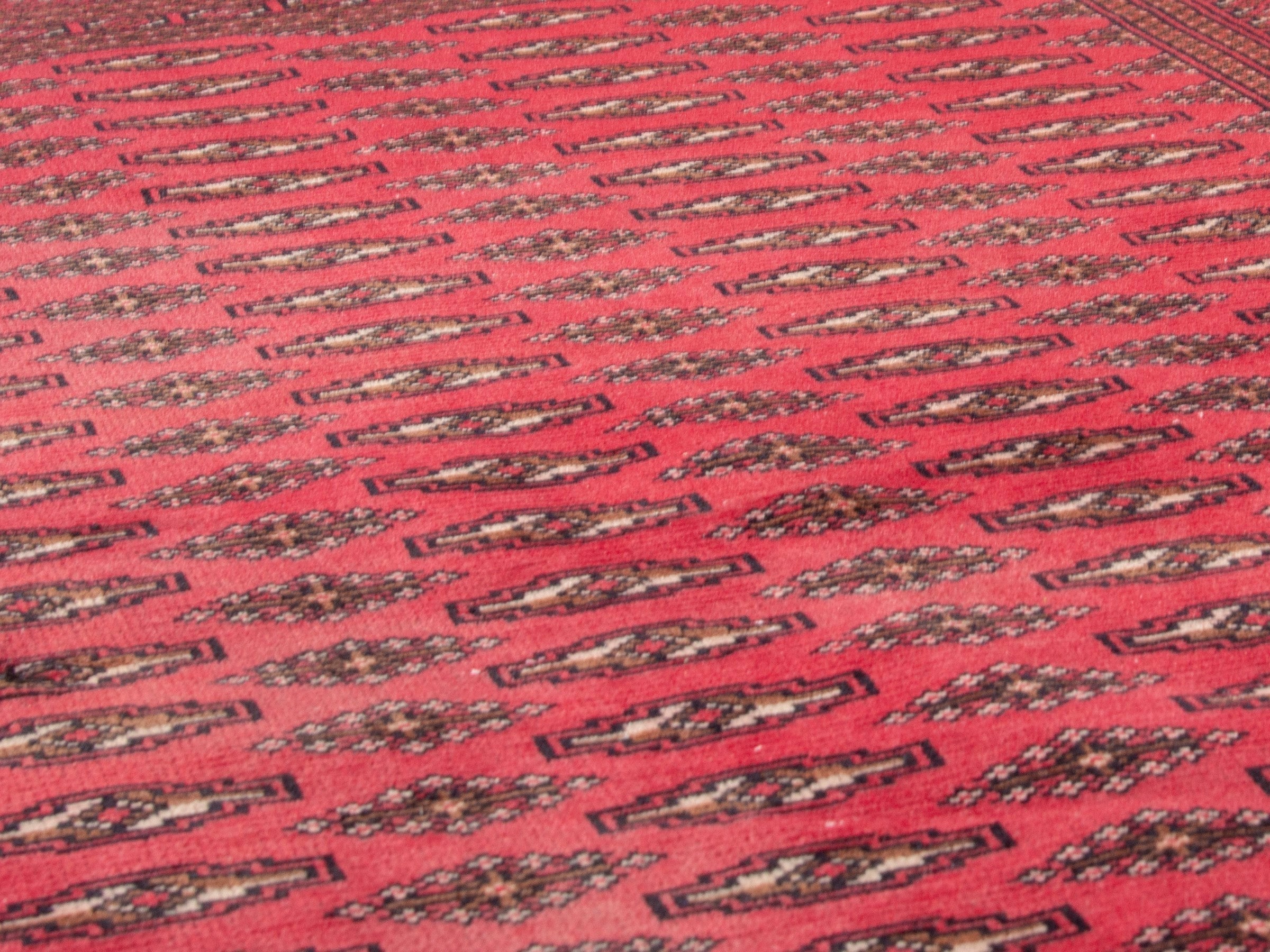 Persian Torkaman accent rug in deep red and burgundy, view 8 of 17