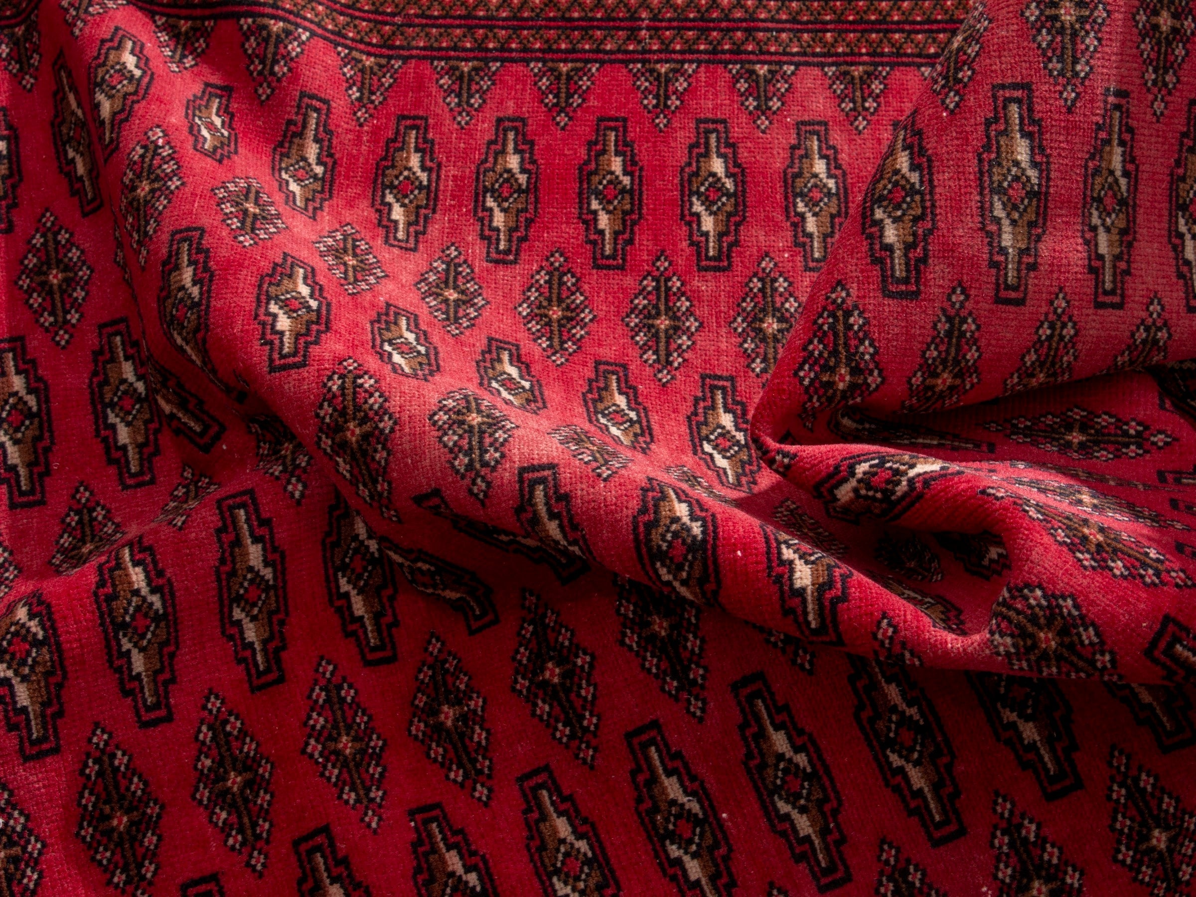 Persian Torkaman accent rug in deep red and burgundy, view 15 of 17