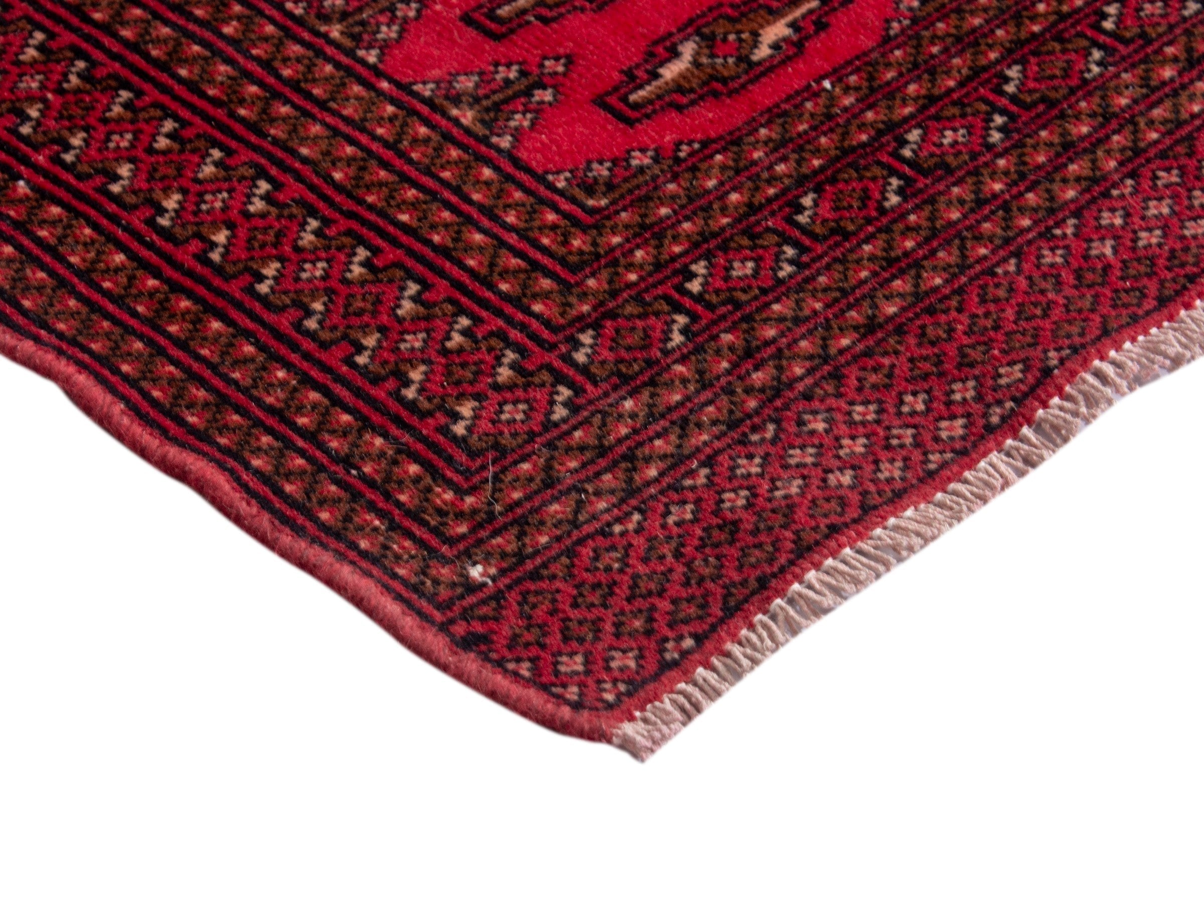 Persian Torkaman accent rug in deep red and burgundy, view 5 of 17