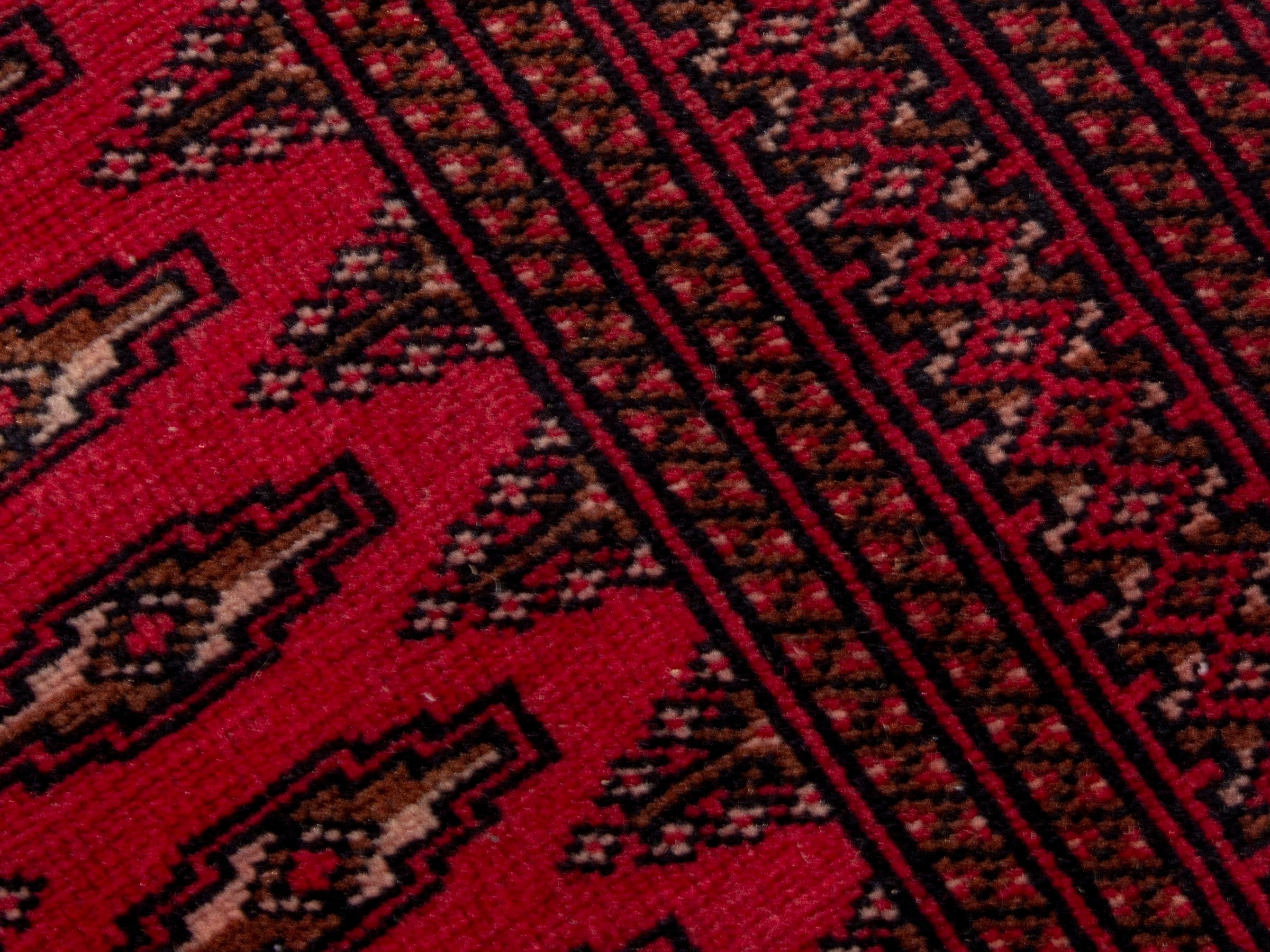 Persian Torkaman accent rug in deep red and burgundy, view 9 of 17