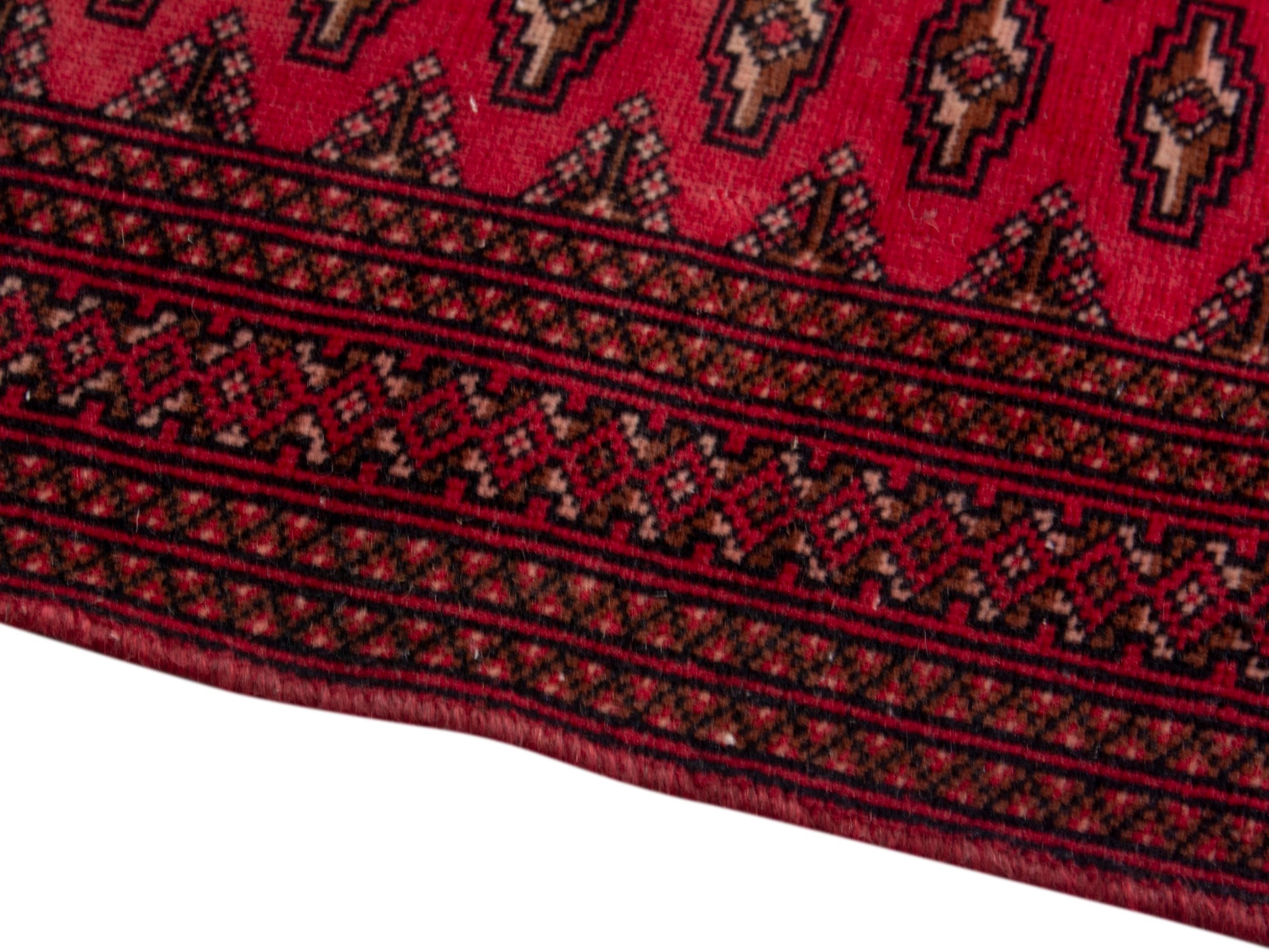 Persian Torkaman accent rug in deep red and burgundy, view 6 of 17