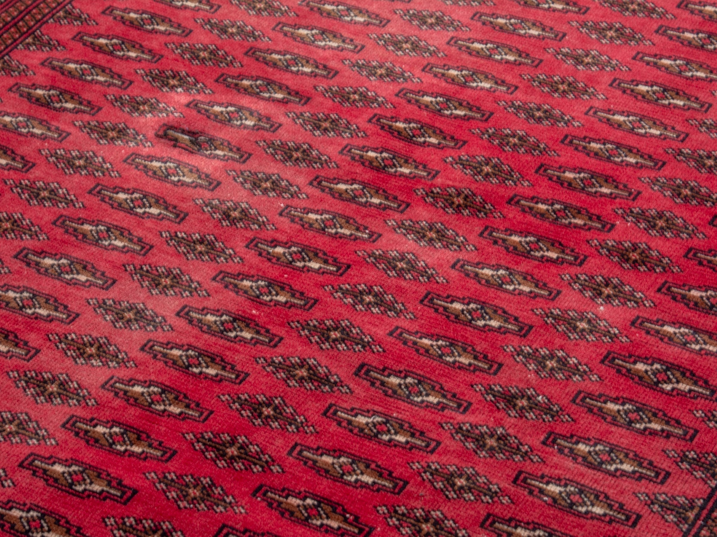 Persian Torkaman accent rug in deep red and burgundy, view 7 of 17