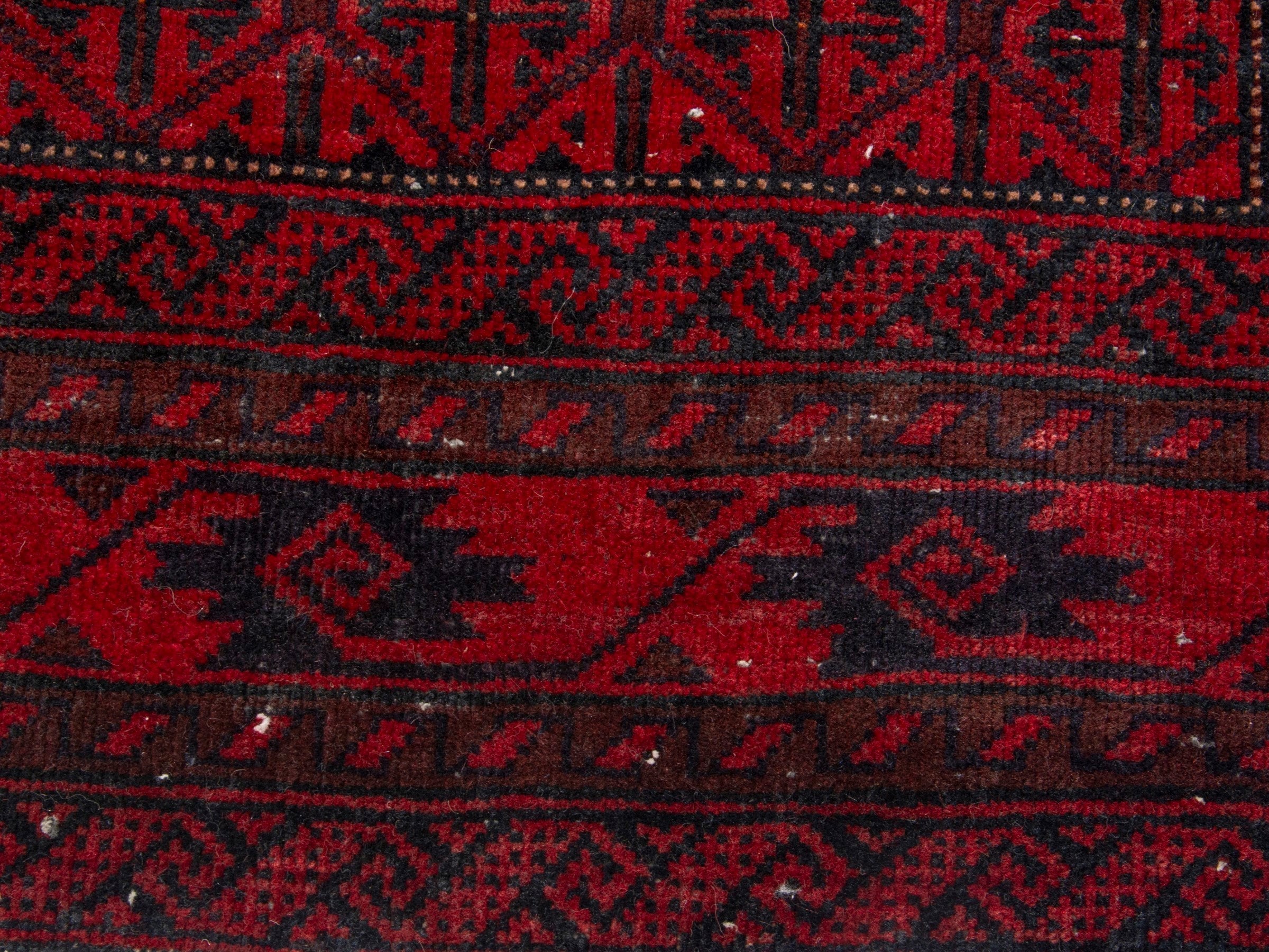 Persian Baluch accent rug in deep red and burgundy, view 11 of 17