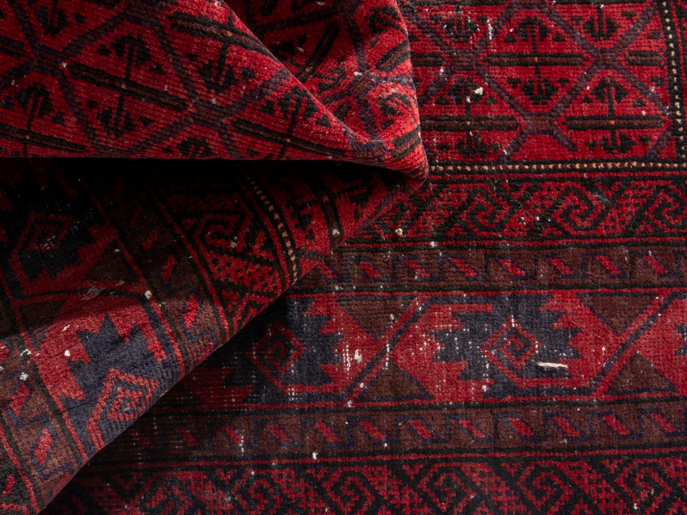 Persian Baluch accent rug in deep red and burgundy, view 14 of 17