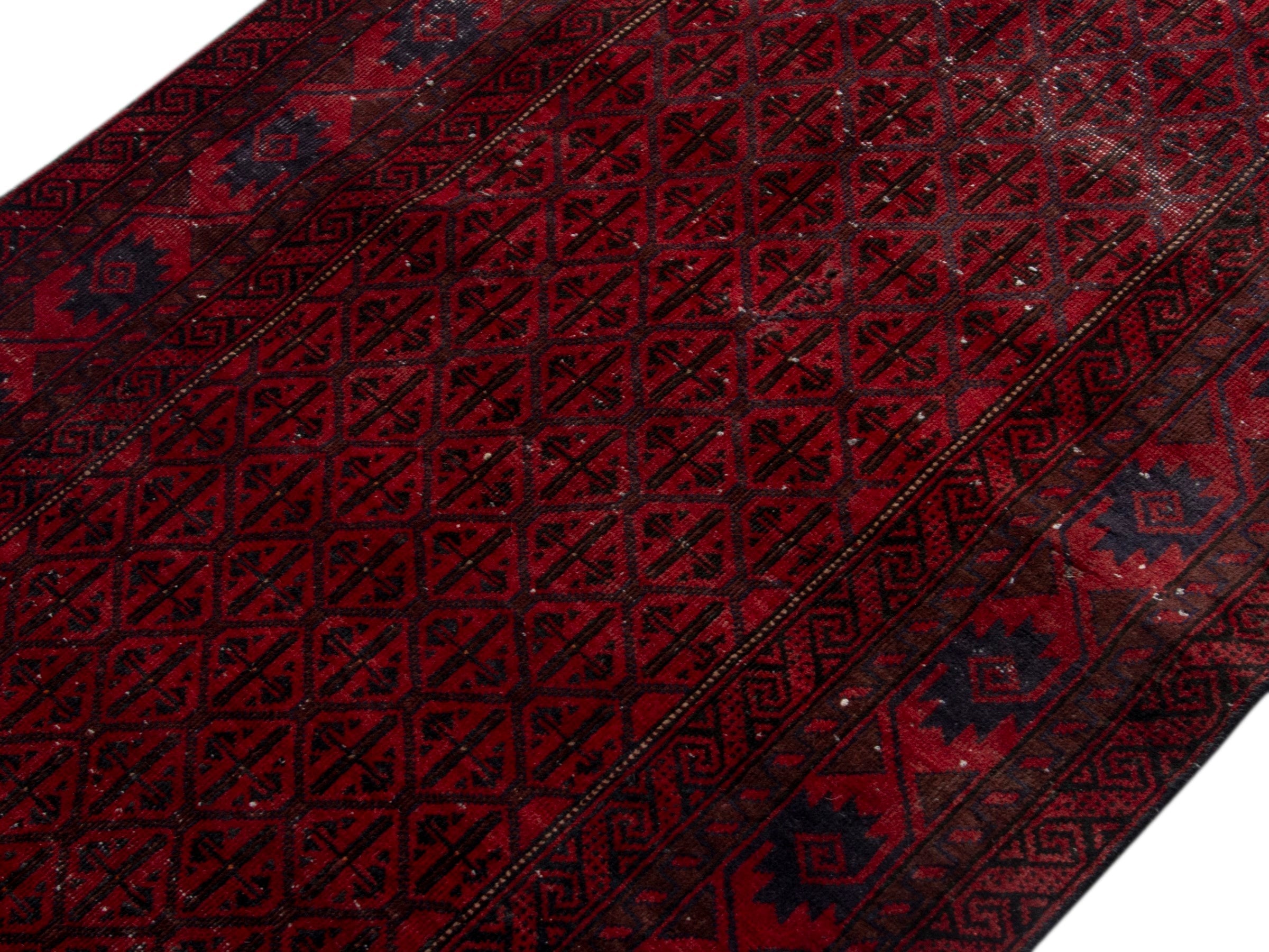 Persian Baluch accent rug in deep red and burgundy, view 4 of 17