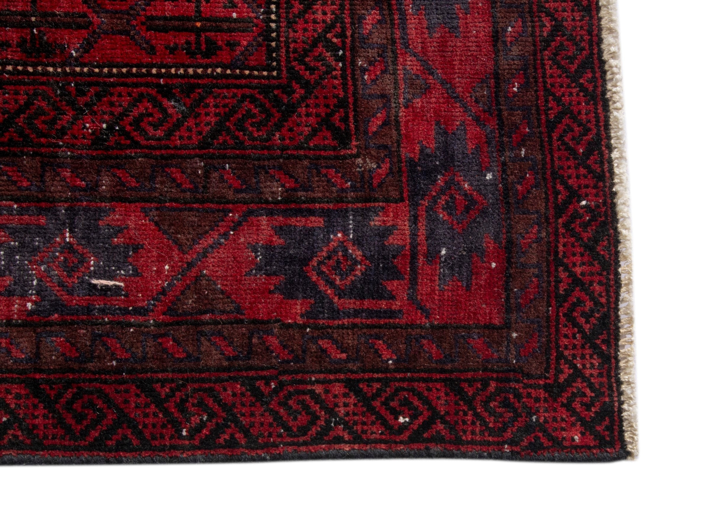 Persian Baluch accent rug in deep red and burgundy, view 10 of 17
