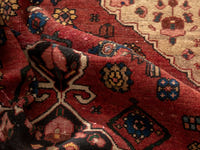 Persian Zanjan area rug in deep red and black, view 19 of 20