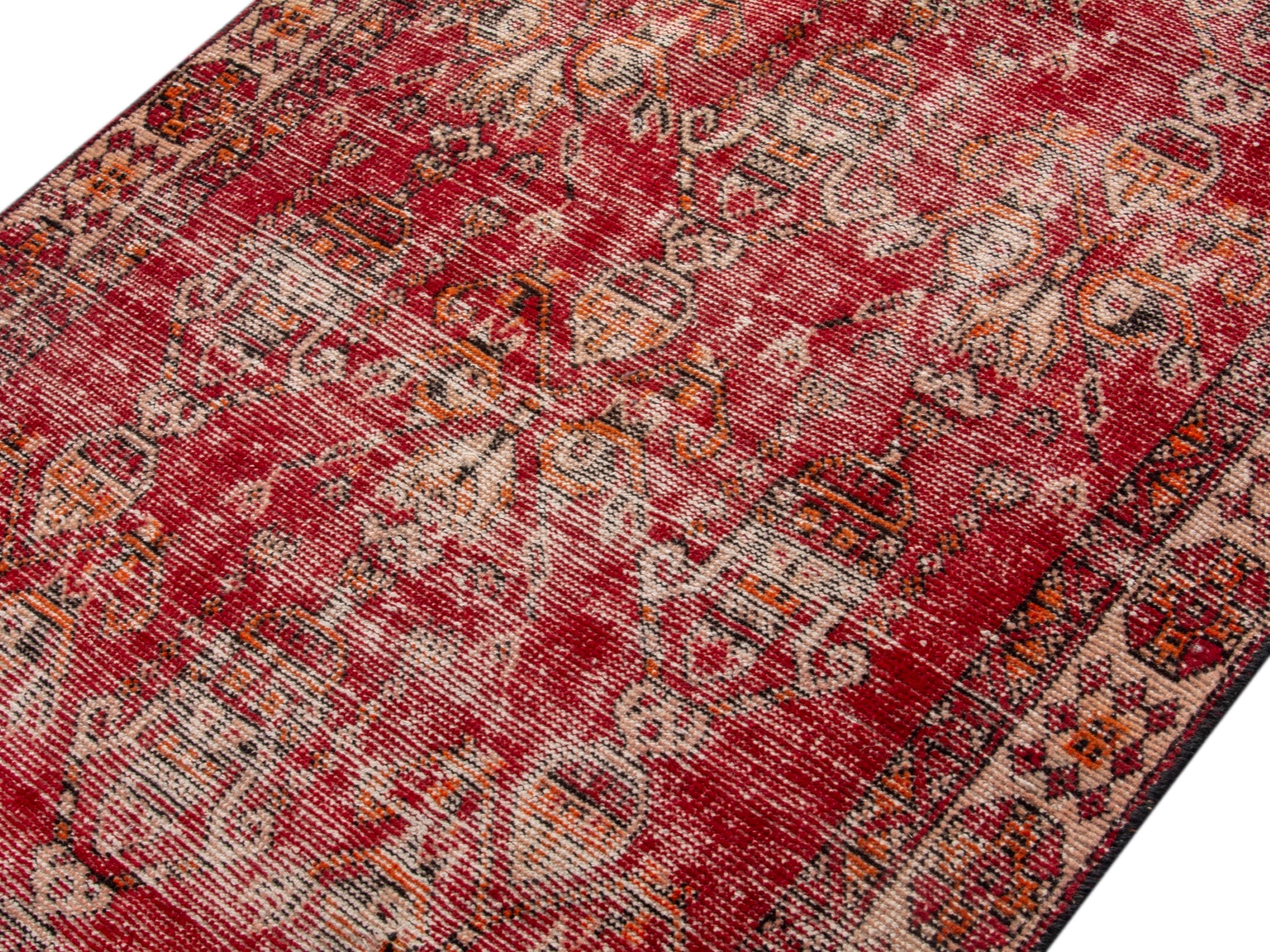 Persian Ferdos accent rug in burgundy and terracotta, view 4 of 17