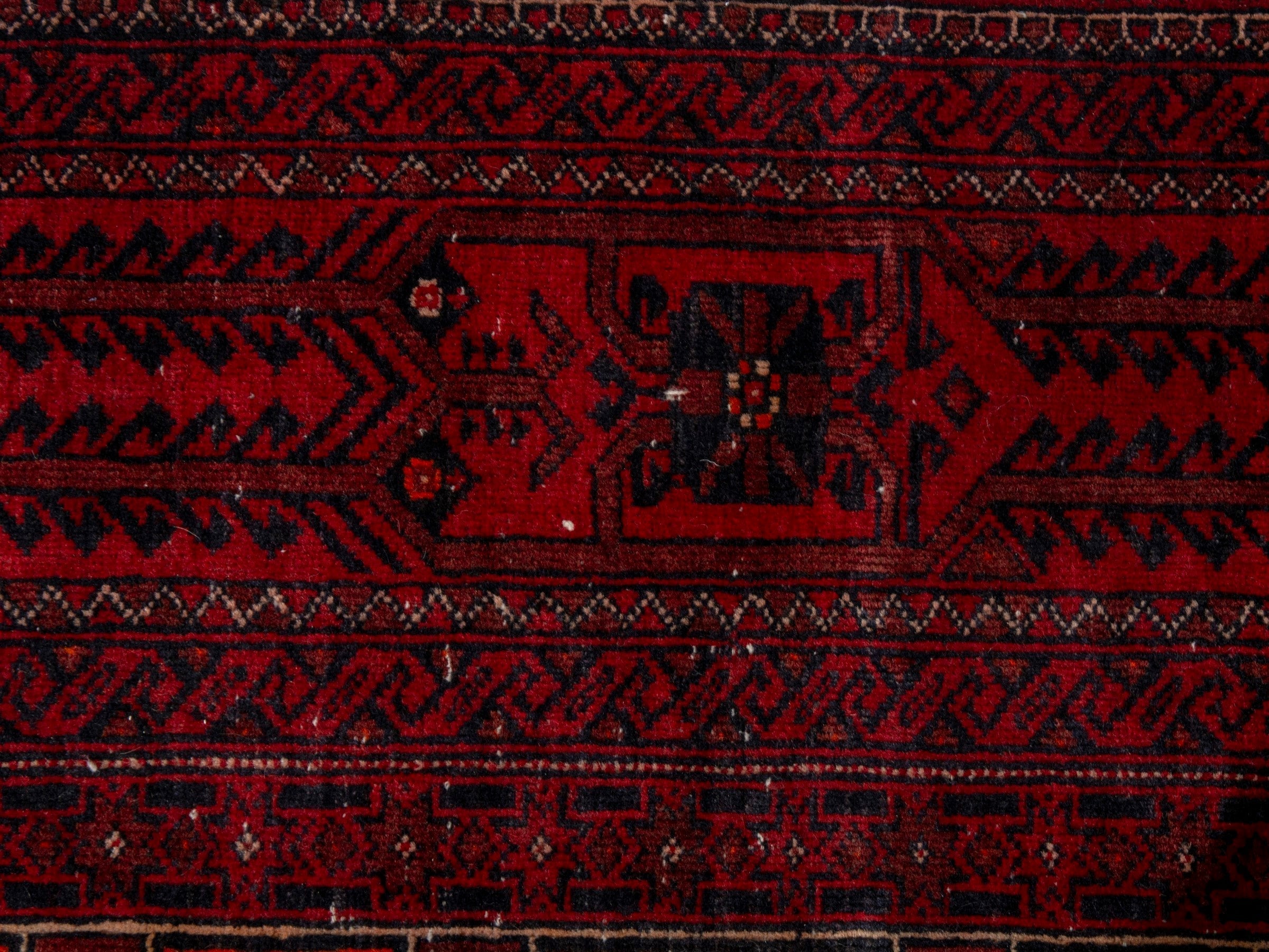 Persian Baluch accent rug in burgundy and deep red, view 13 of 19
