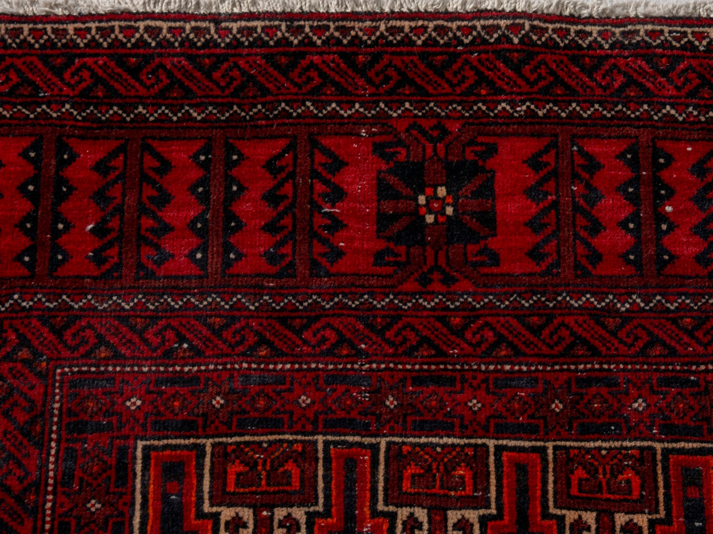 Persian Baluch accent rug in burgundy and deep red, view 14 of 19