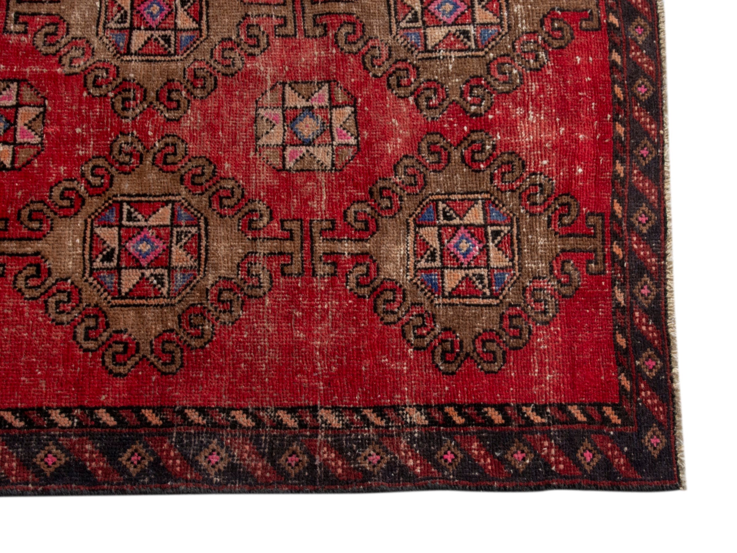 Persian Ferdos area rug in deep red and dark brown, view 10 of 18