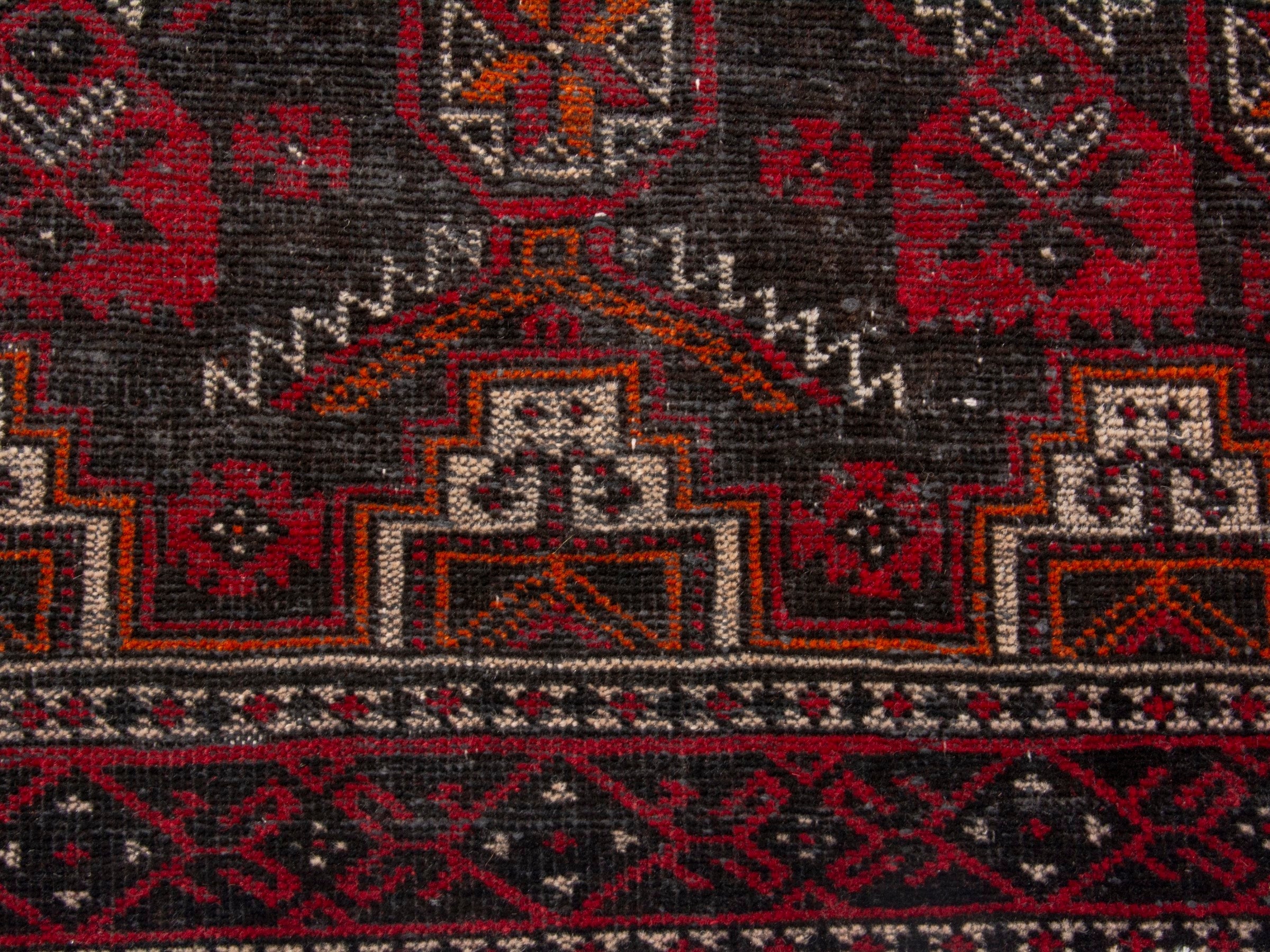 Persian Baluch accent rug in deep red and burgundy, view 11 of 17