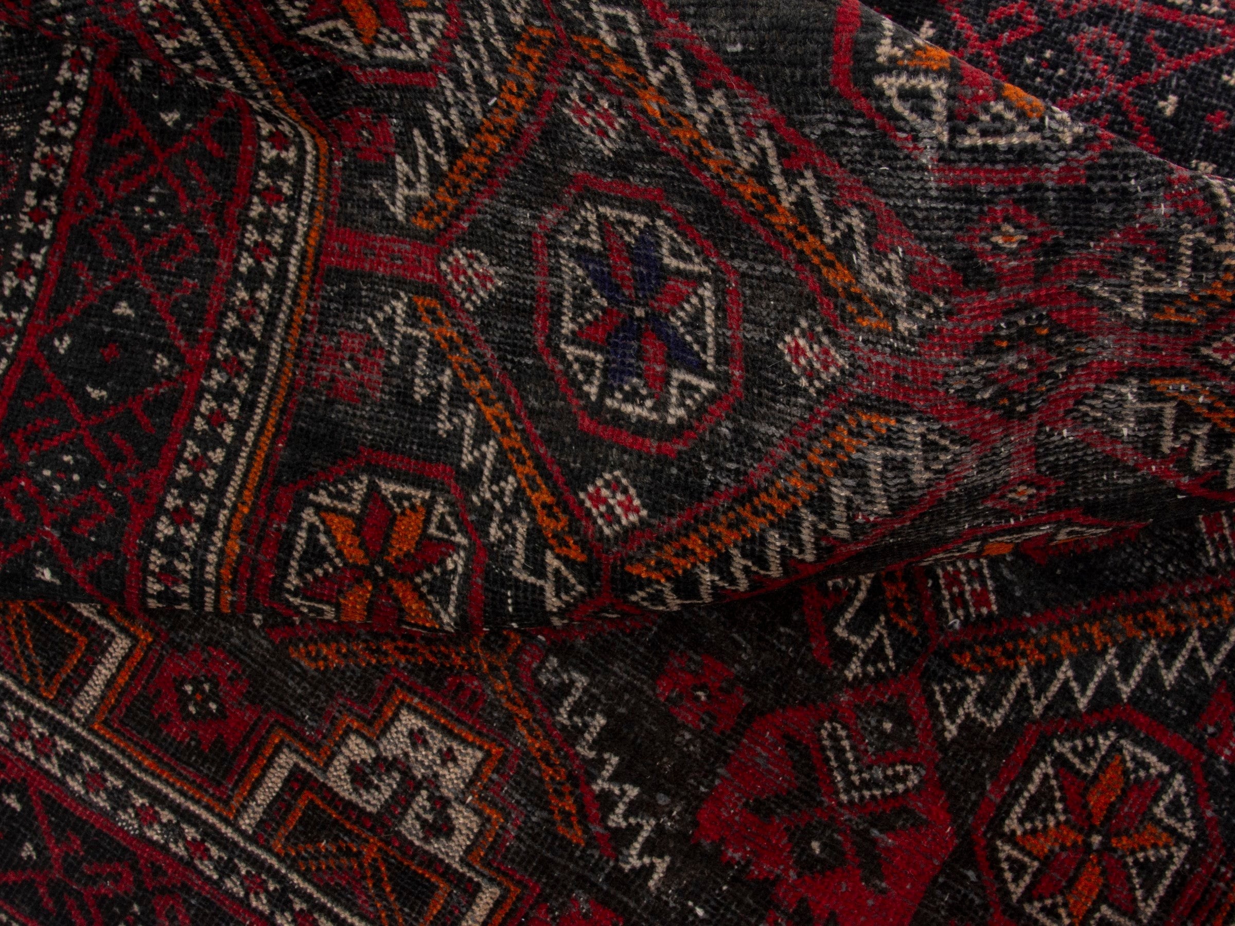 Persian Baluch accent rug in deep red and burgundy, view 16 of 17
