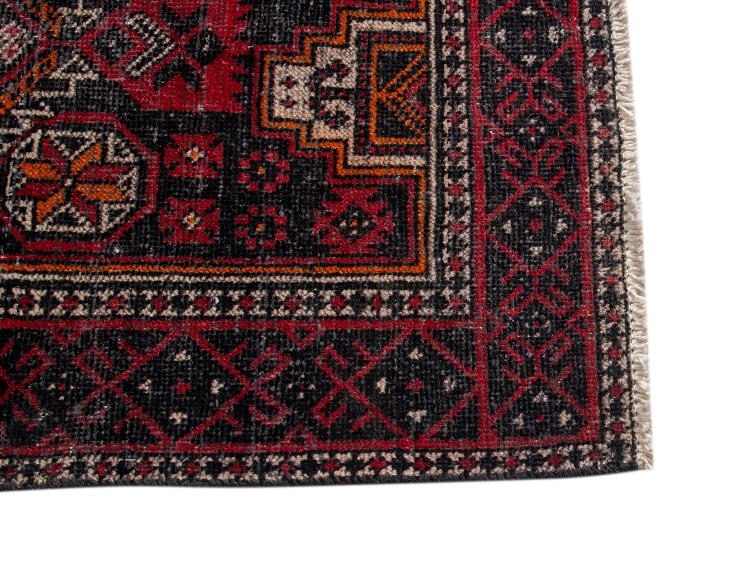 Persian Baluch accent rug in deep red and burgundy, view 10 of 17