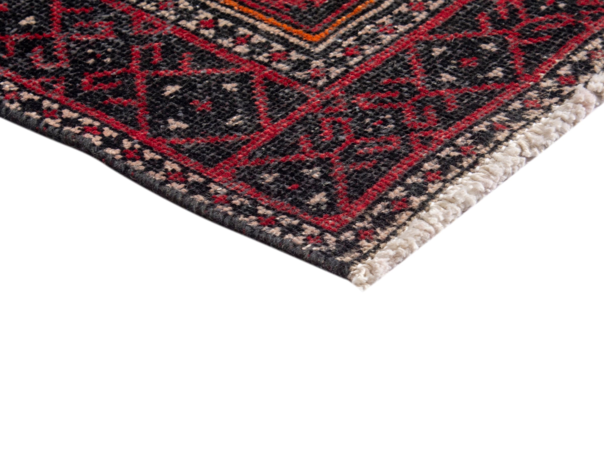 Persian Baluch accent rug in deep red and burgundy, view 5 of 17