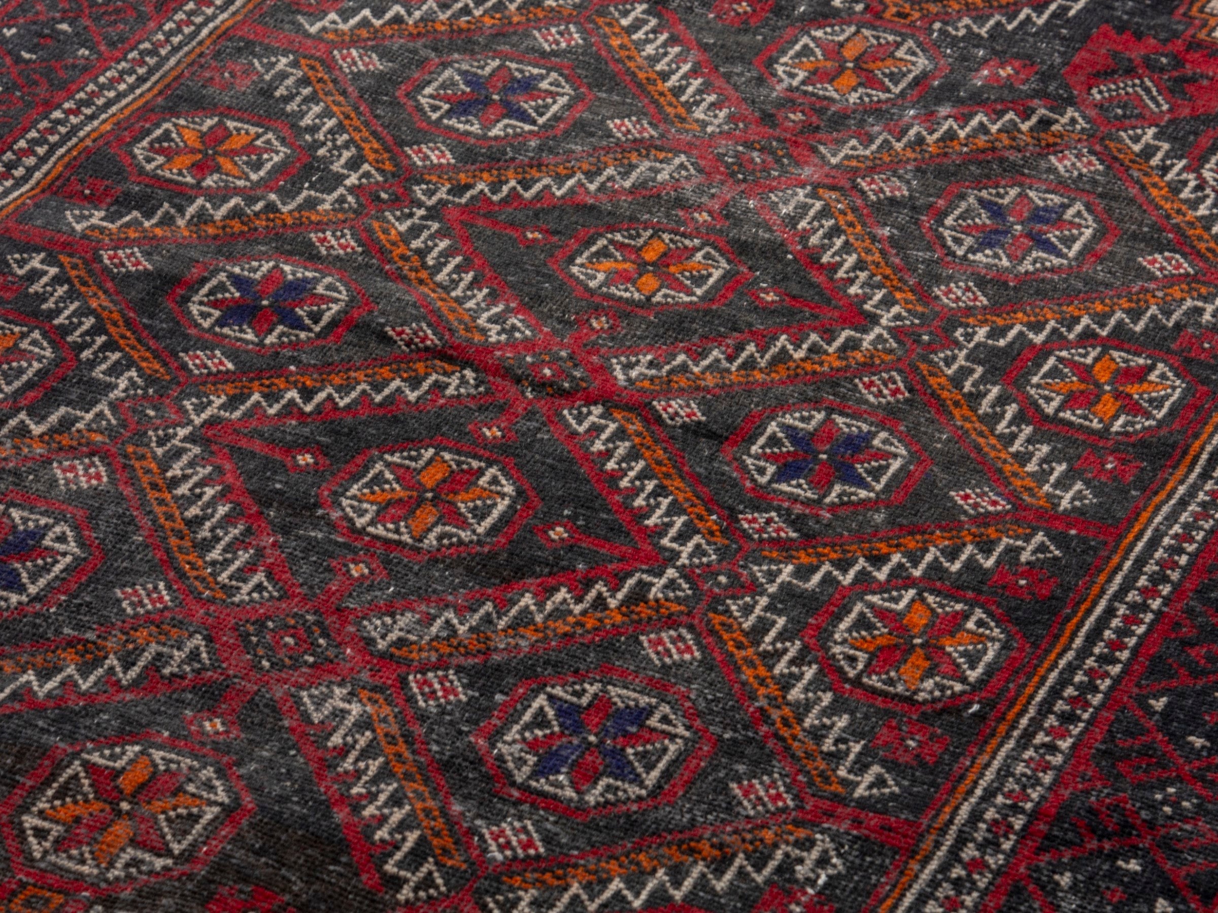 Persian Baluch accent rug in deep red and burgundy, view 7 of 17