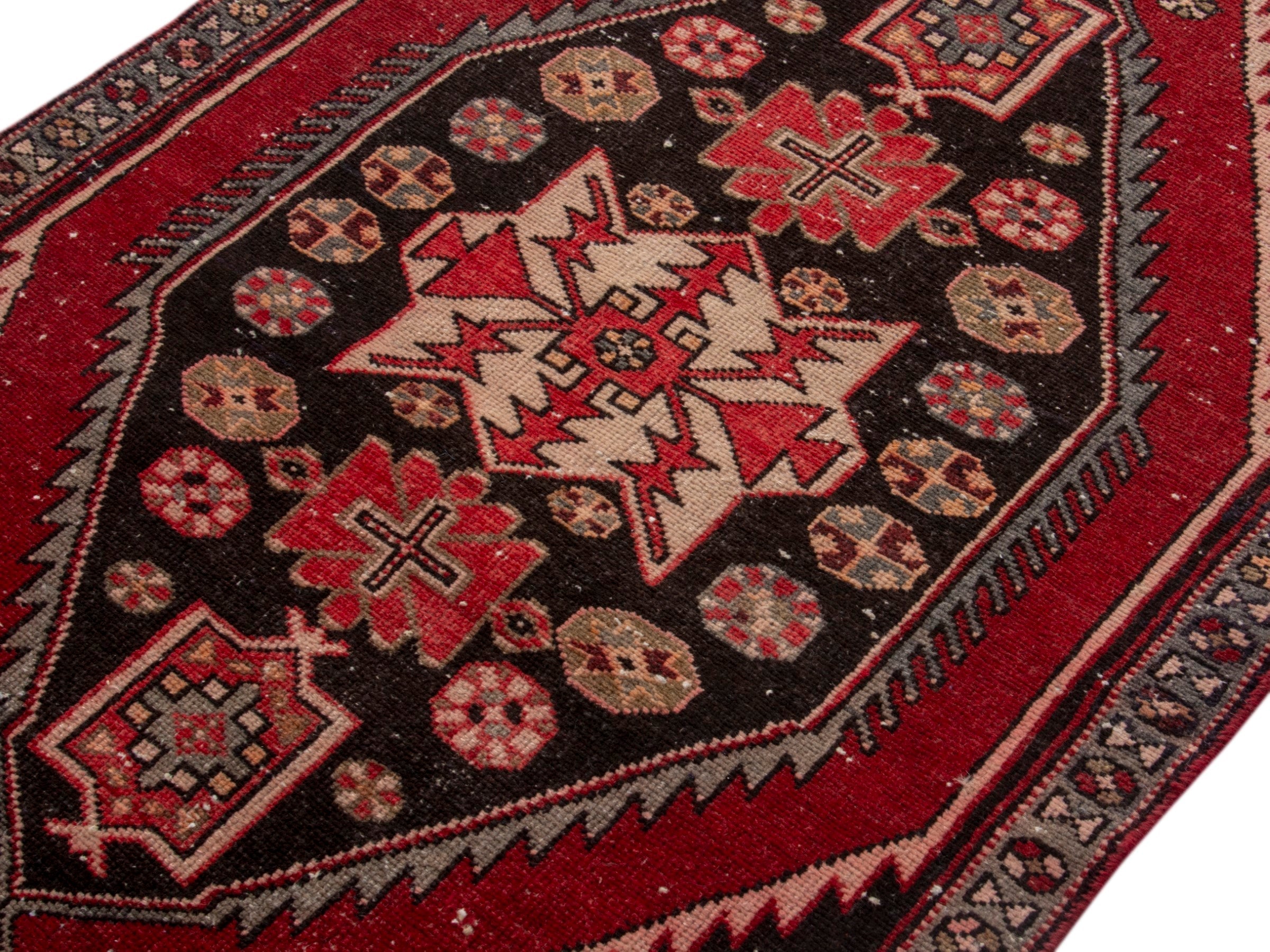 Persian Saveh accent rug in deep red and black cherry, view 4 of 17