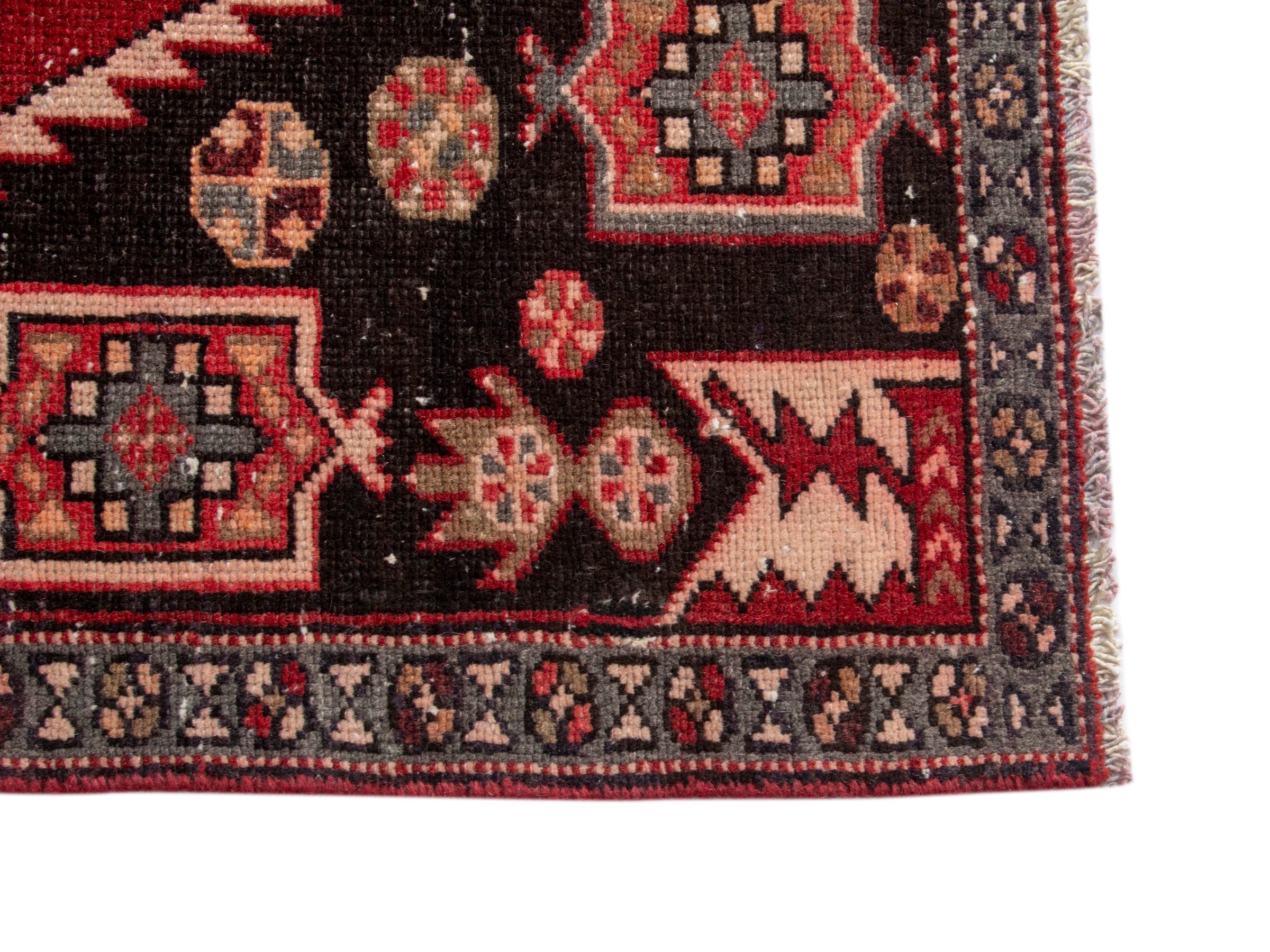 Persian Saveh accent rug in deep red and black cherry, view 10 of 17