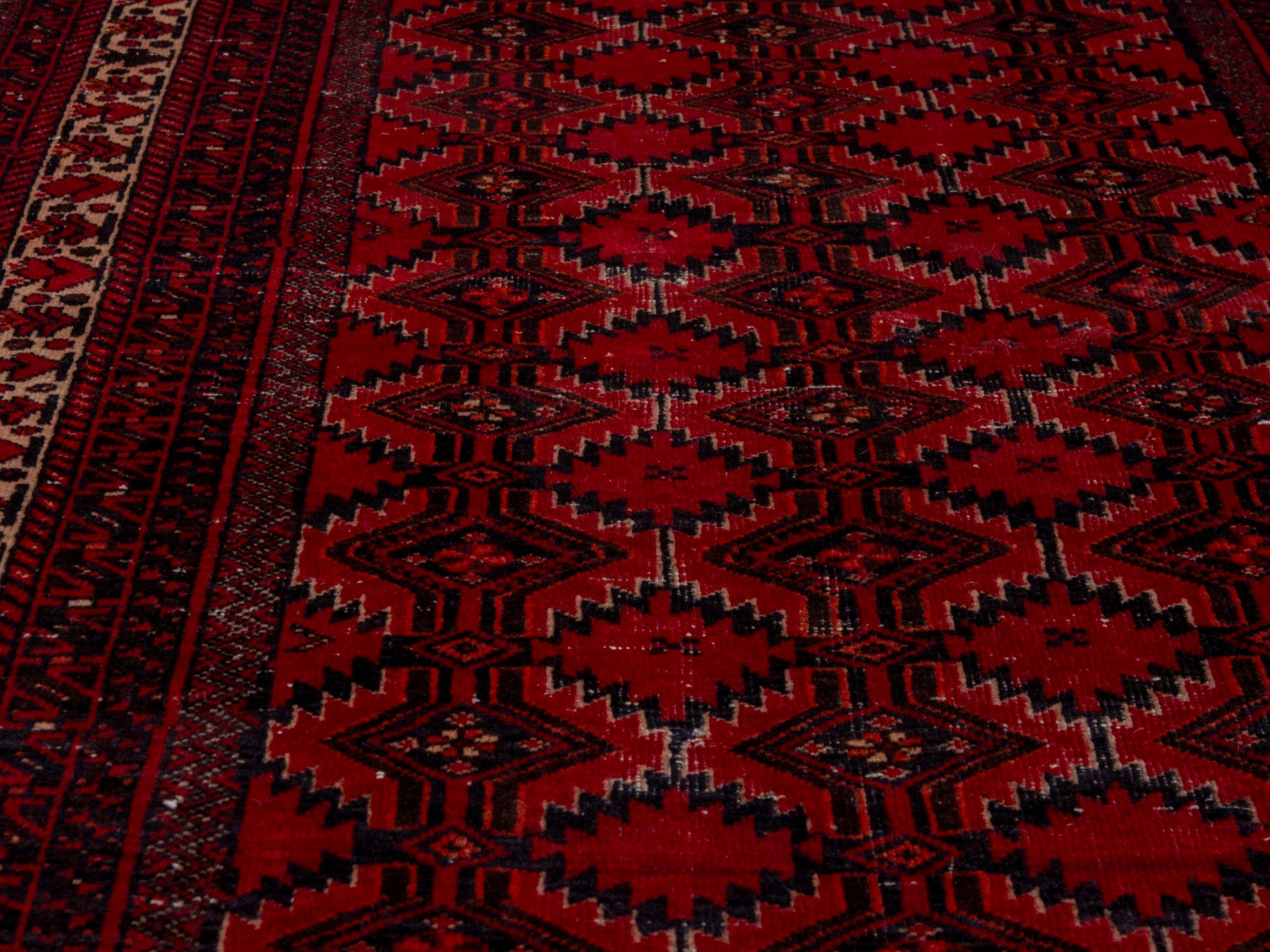 Persian Baluch accent rug in burgundy and deep red, view 7 of 16