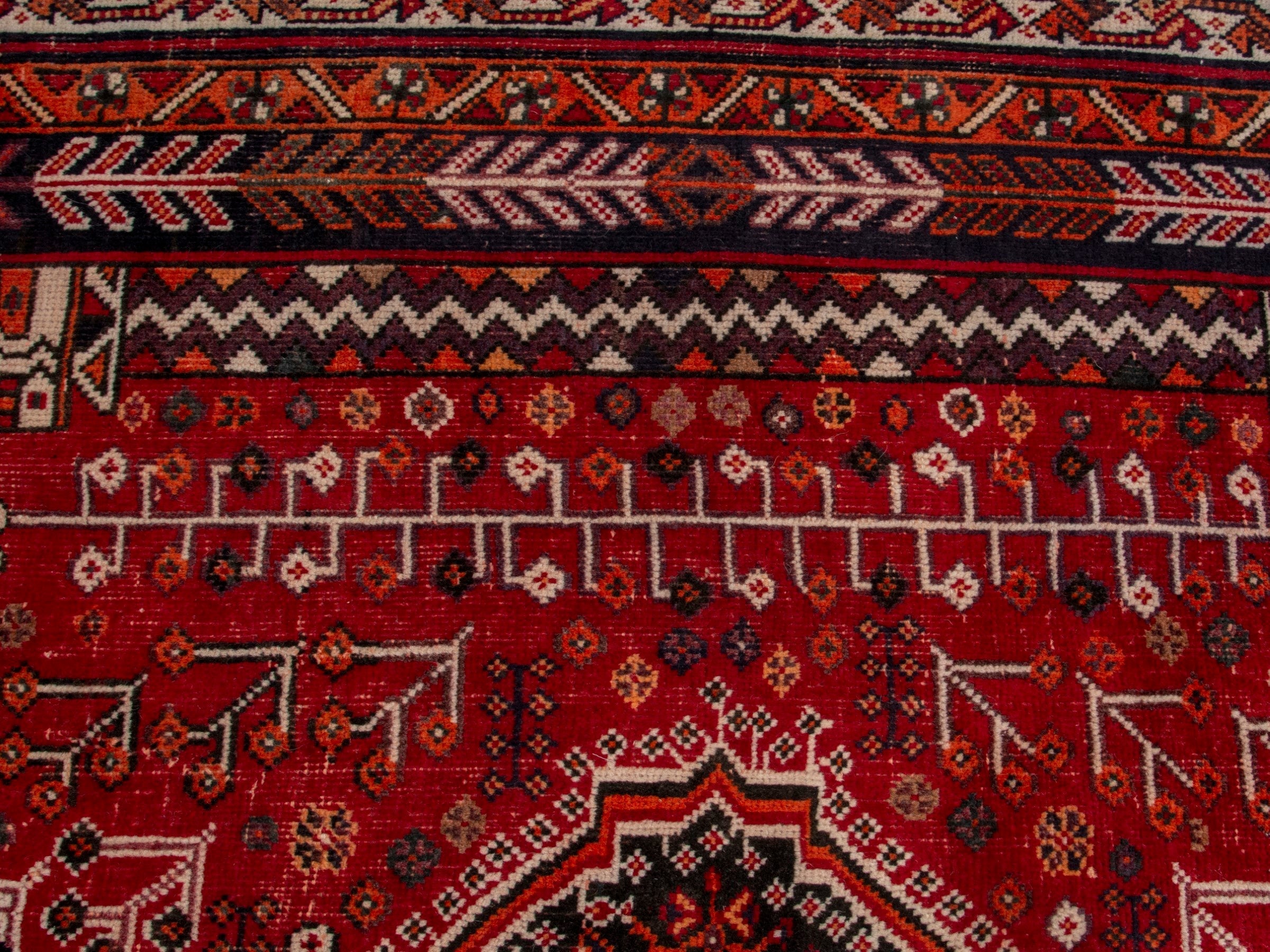 Persian Shiraz area rug in deep red and burgundy, view 13 of 19
