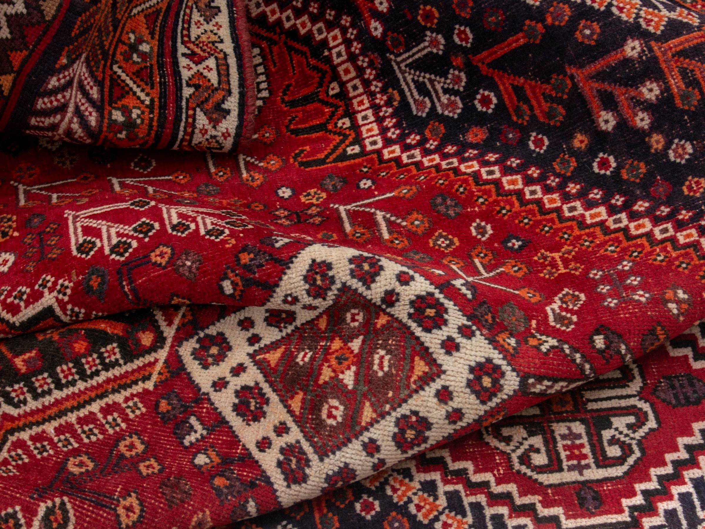 Persian Shiraz area rug in deep red and burgundy, view 15 of 19