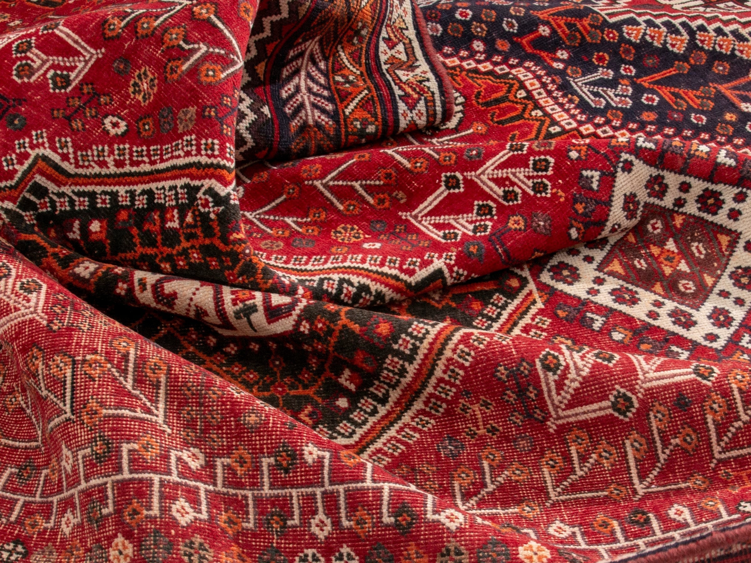 Persian Shiraz area rug in deep red and burgundy, view 18 of 19
