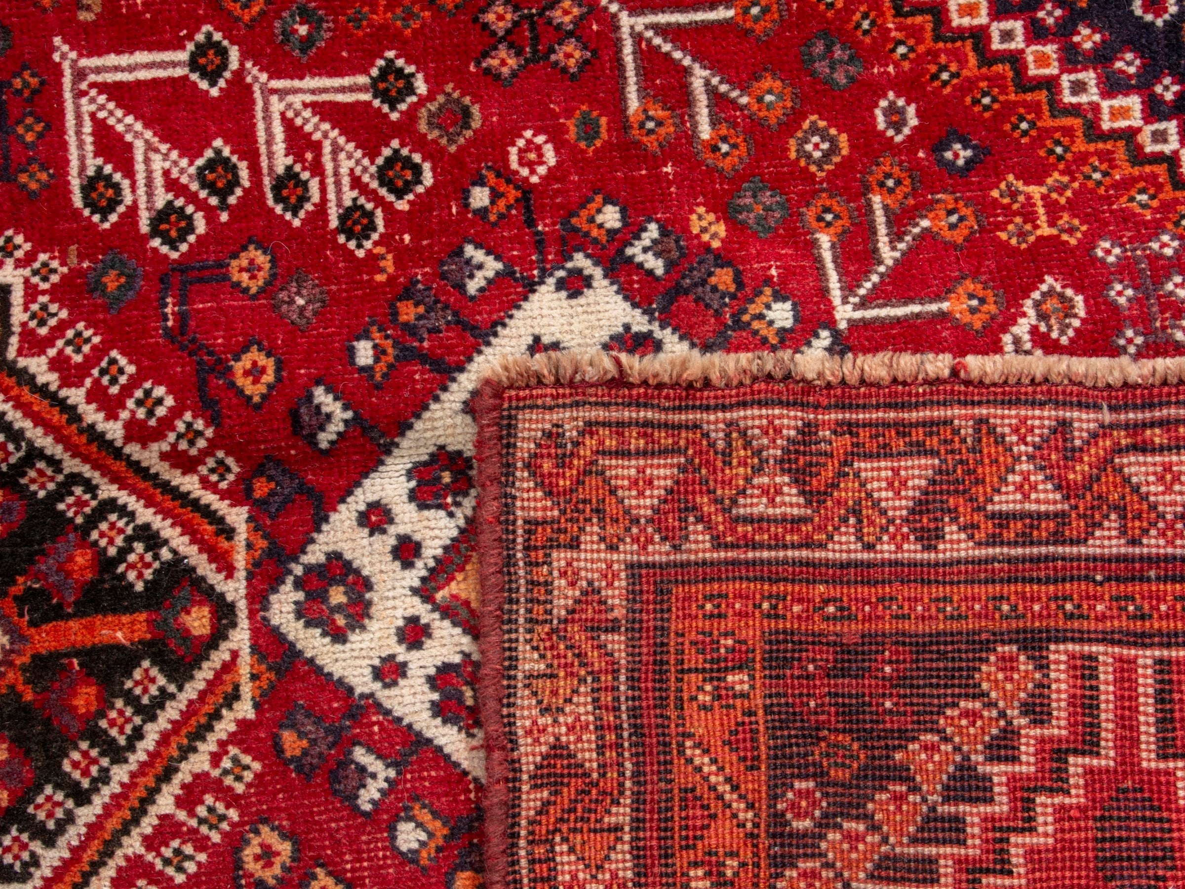 Persian Shiraz area rug in deep red and burgundy, view 19 of 19