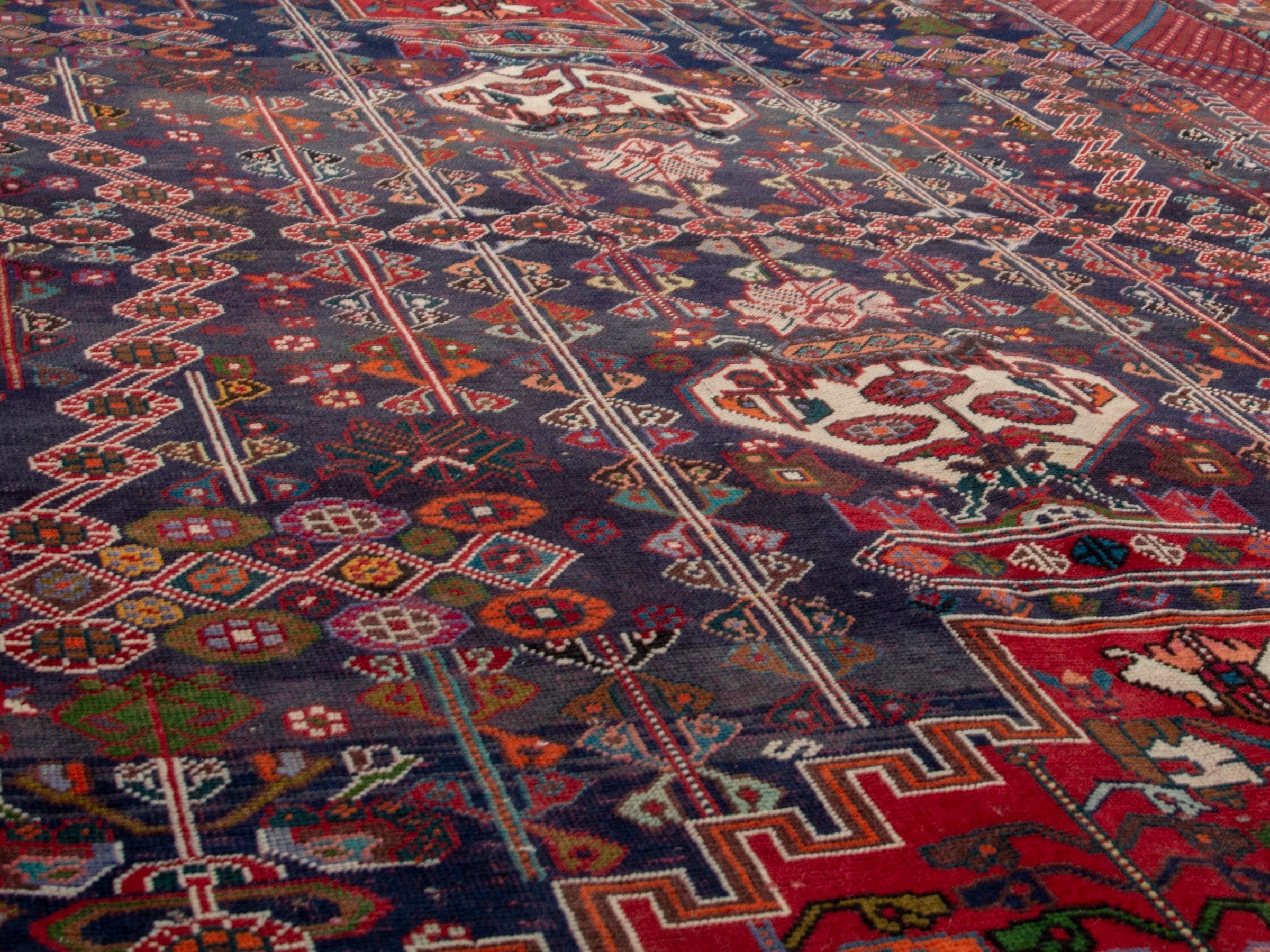 Persian Shiraz area rug in deep indigo and deep red, view 8 of 19