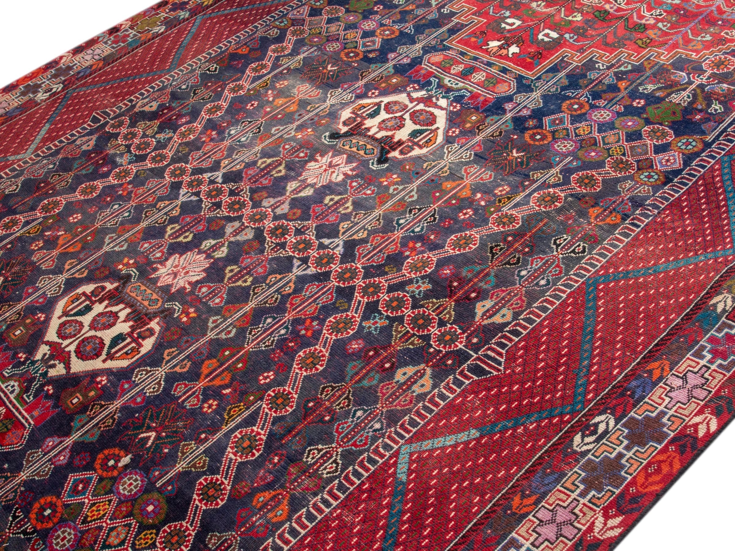 Persian Shiraz area rug in deep indigo and deep red, view 4 of 19