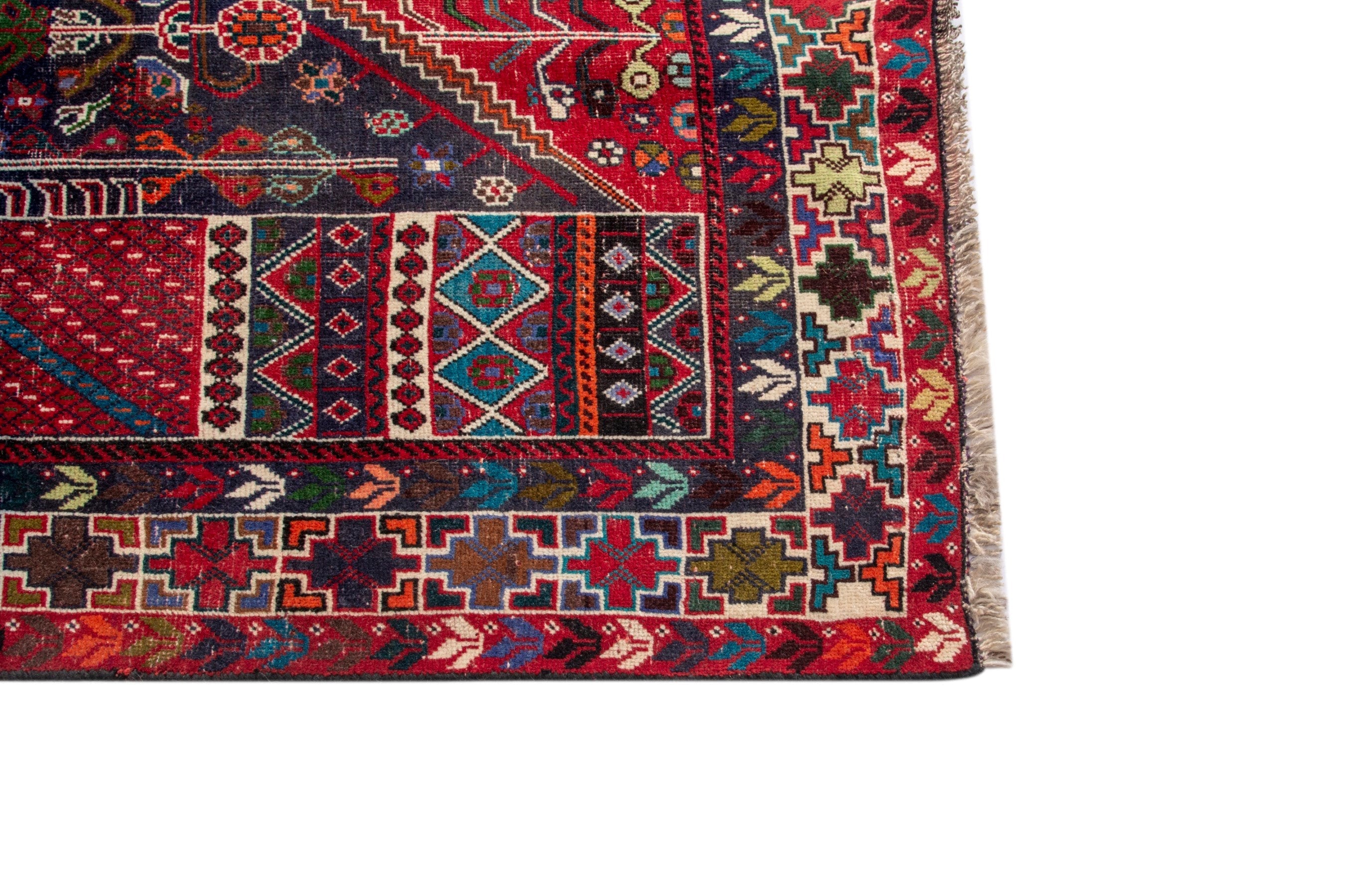 Persian Shiraz area rug in deep indigo and deep red, view 10 of 19