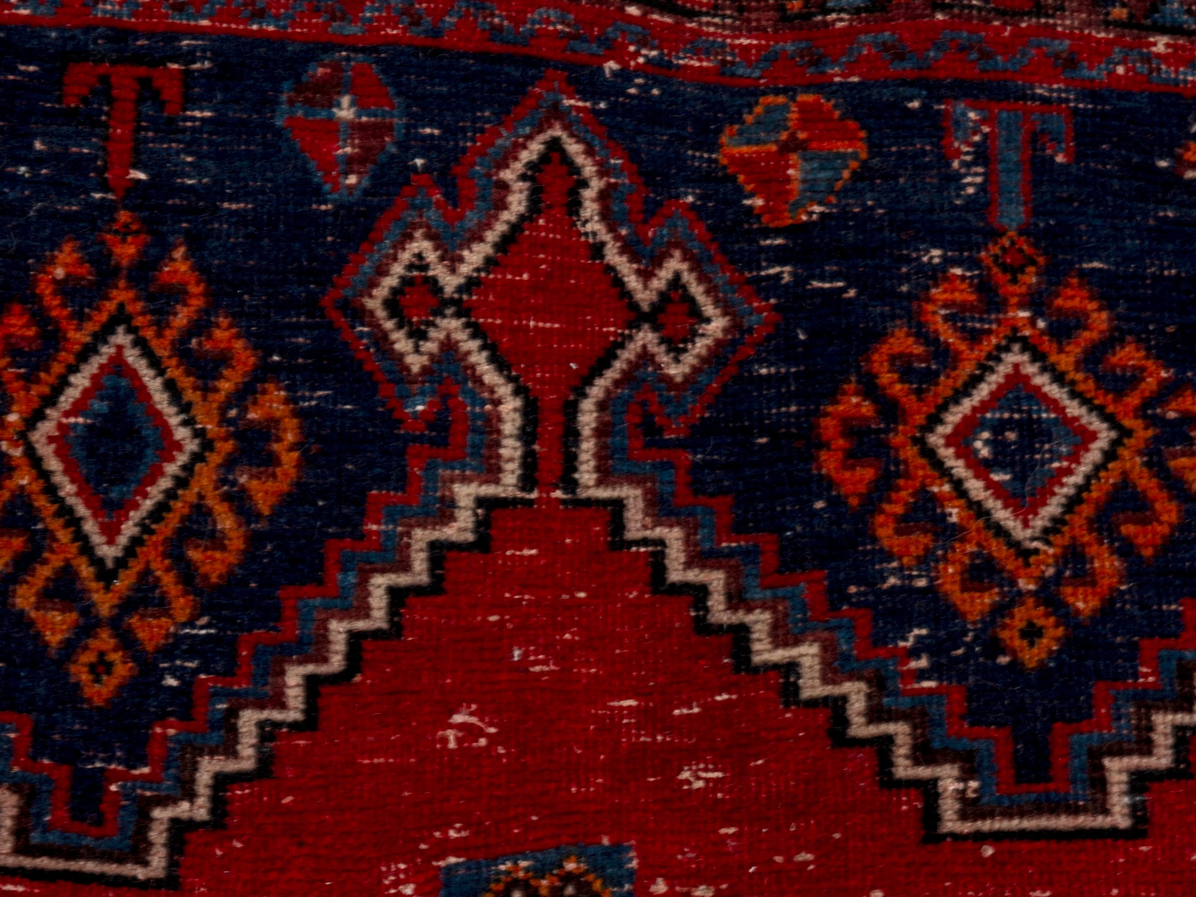 Persian Sirjan area rug in deep red and navy, view 16 of 22