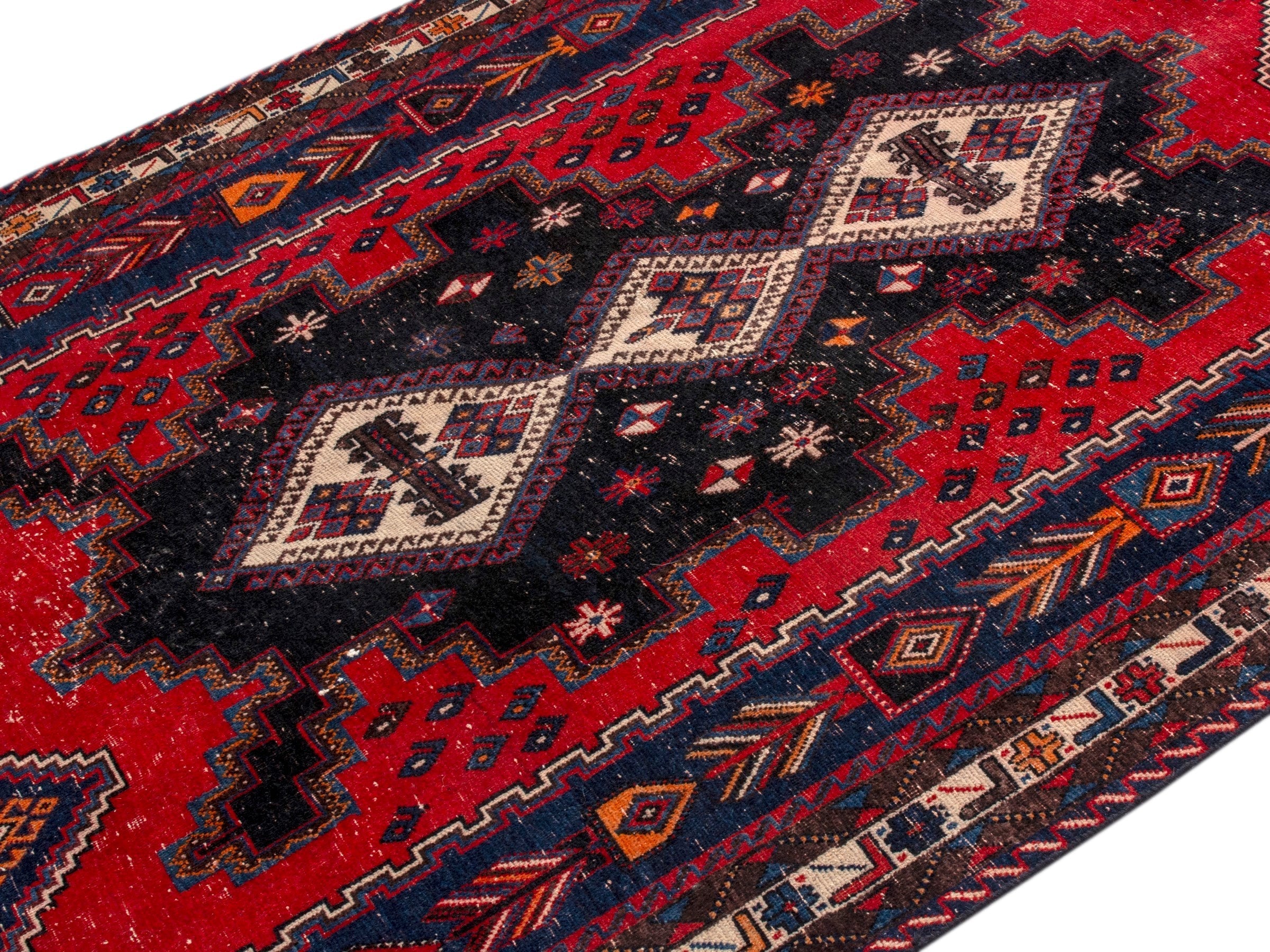 Persian Sirjan area rug in deep red and navy, view 4 of 22