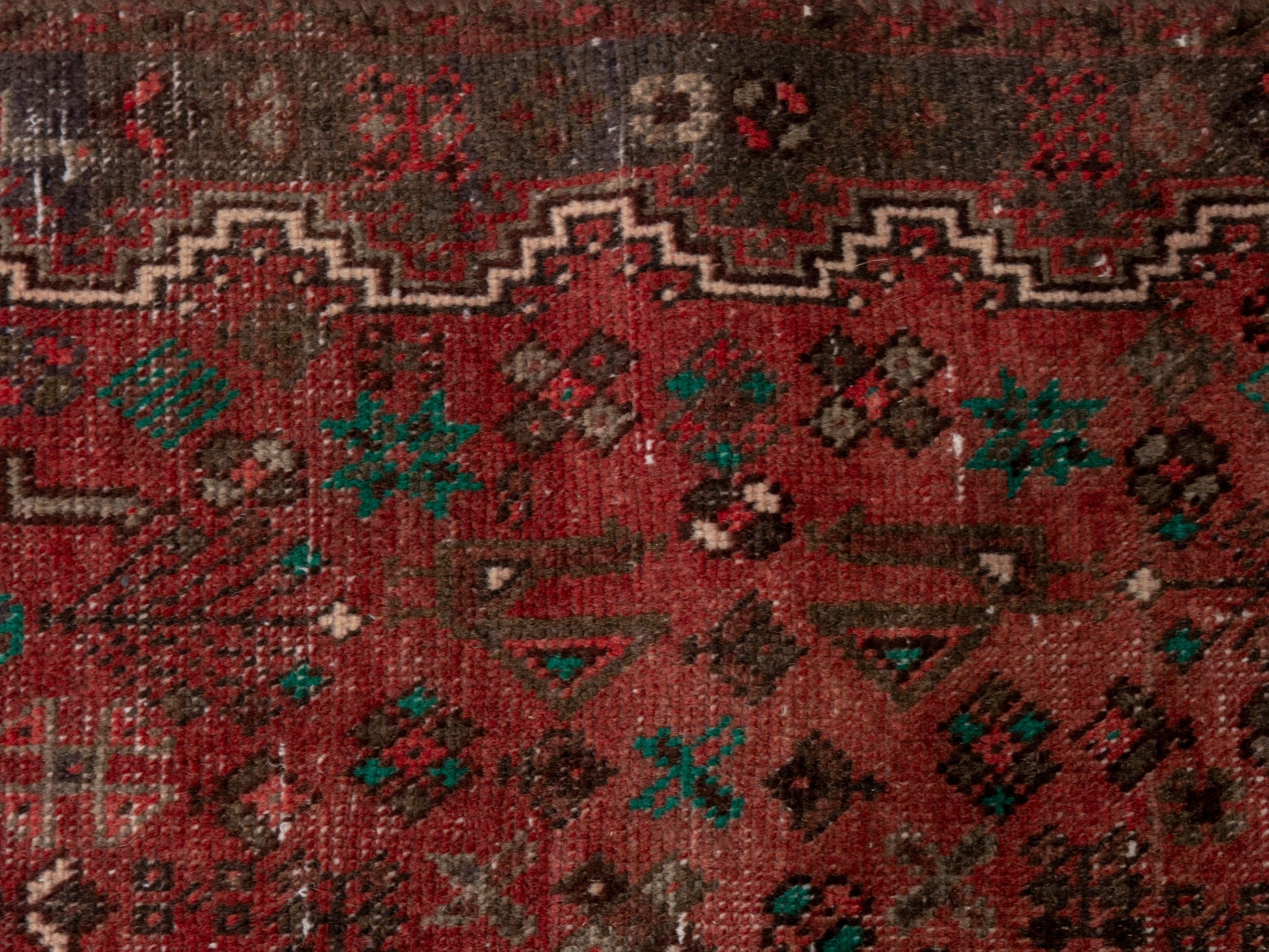 Persian Shiraz area rug in faded red and dark brown, view 8 of 15