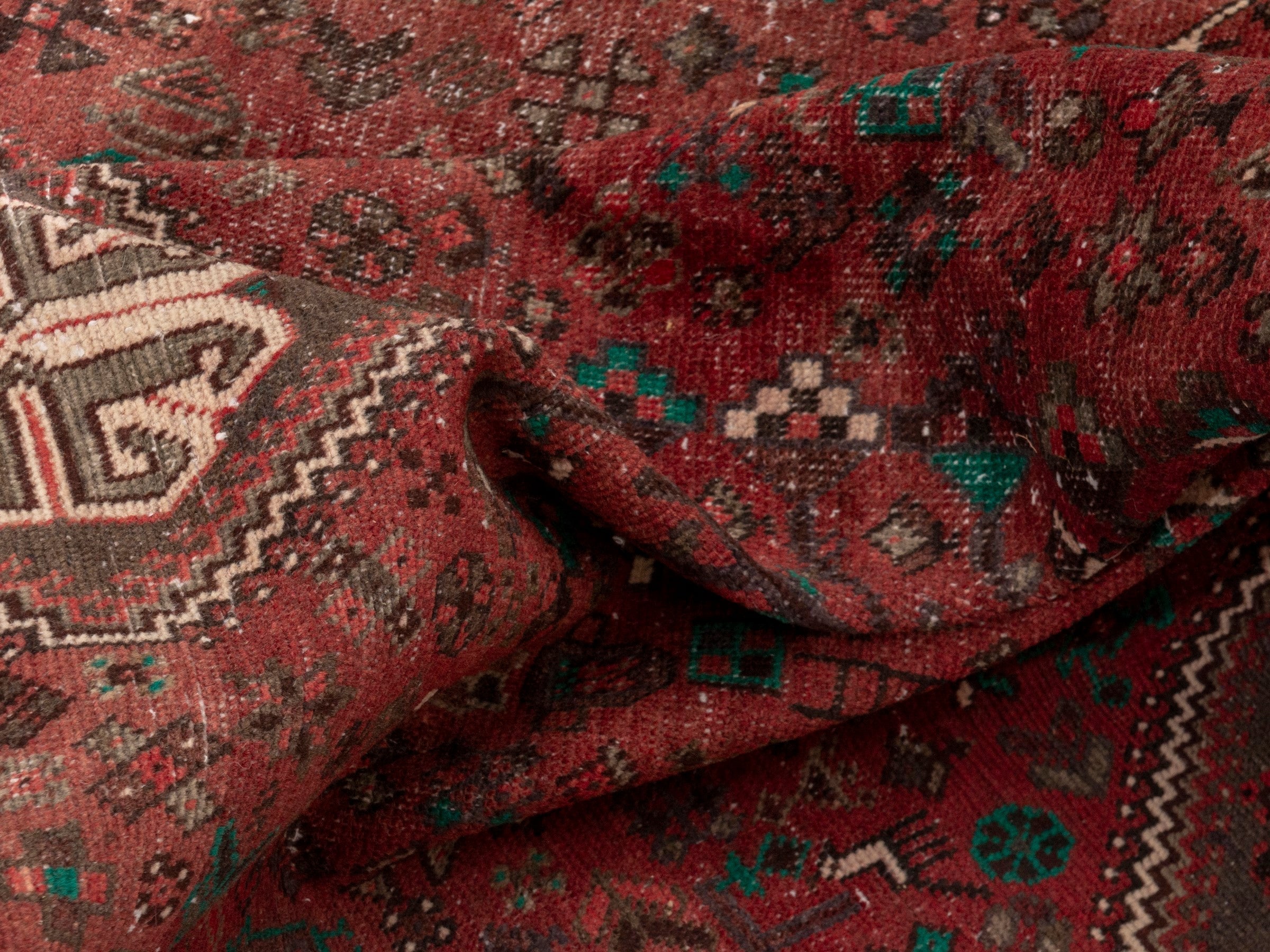 Persian Shiraz area rug in faded red and dark brown, view 12 of 15