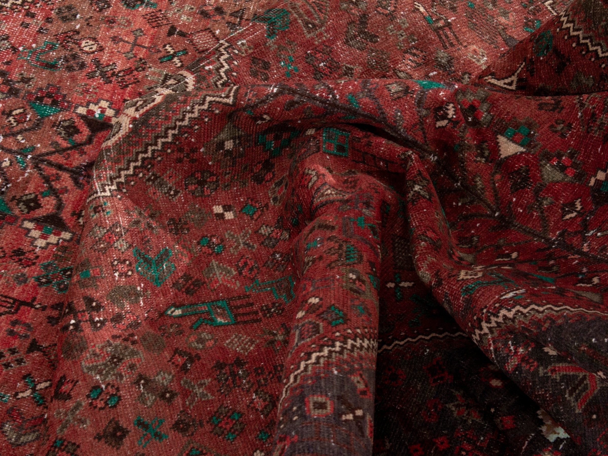 Persian Shiraz area rug in faded red and dark brown, view 13 of 15