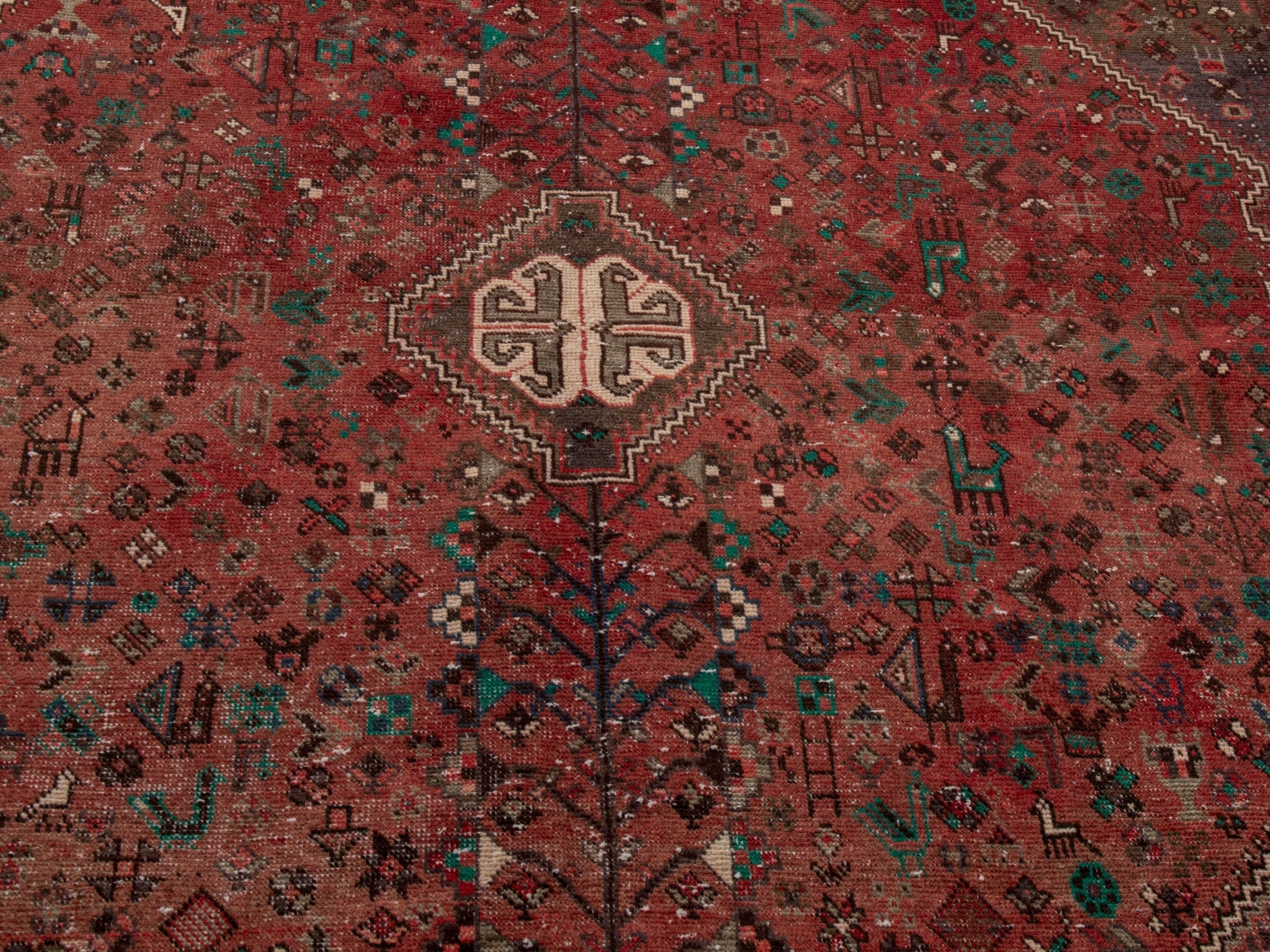 Persian Shiraz area rug in faded red and dark brown, view 9 of 15