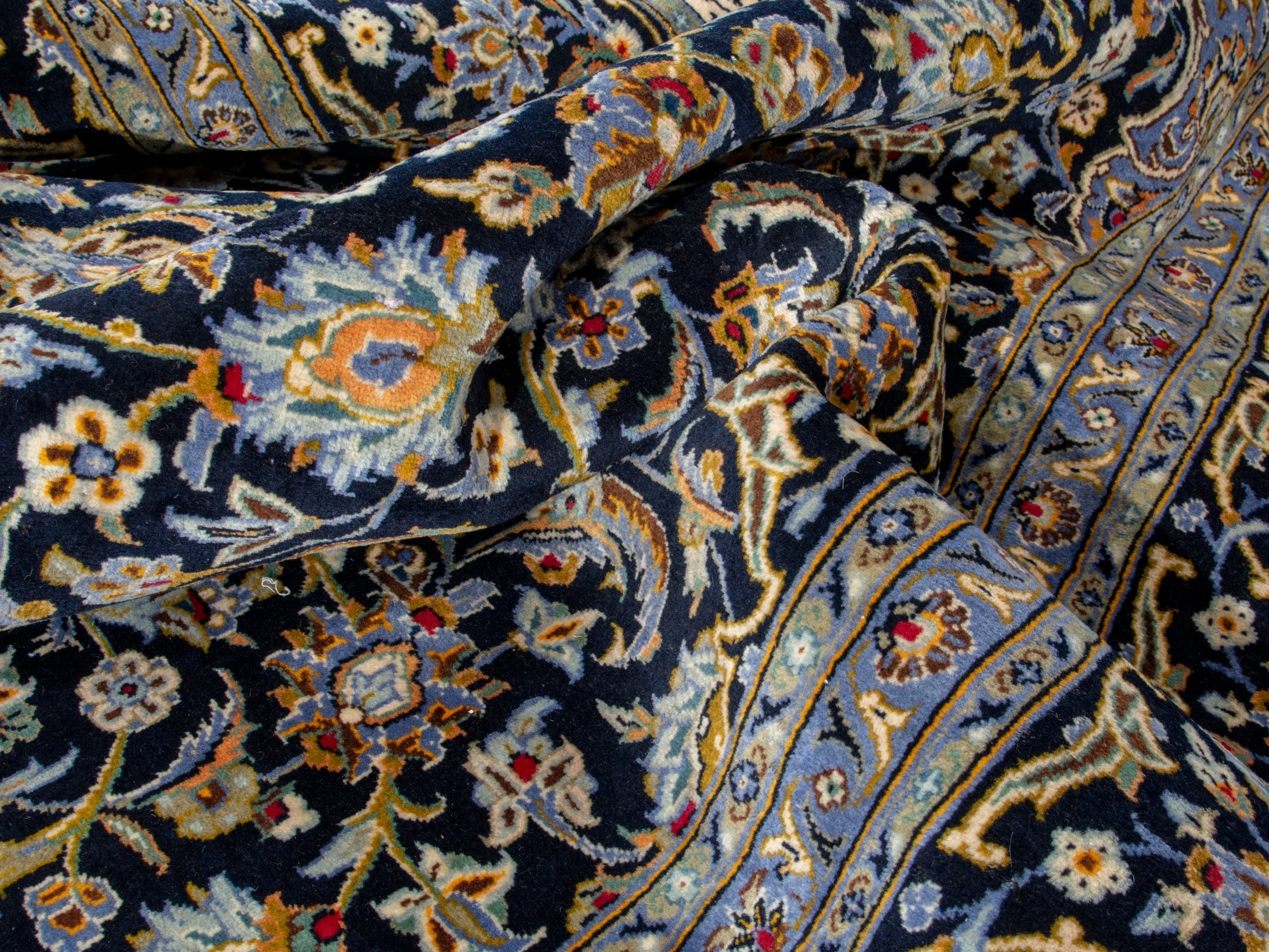 Persian Kashan oversized rug in navy and tan, view 18 of 20